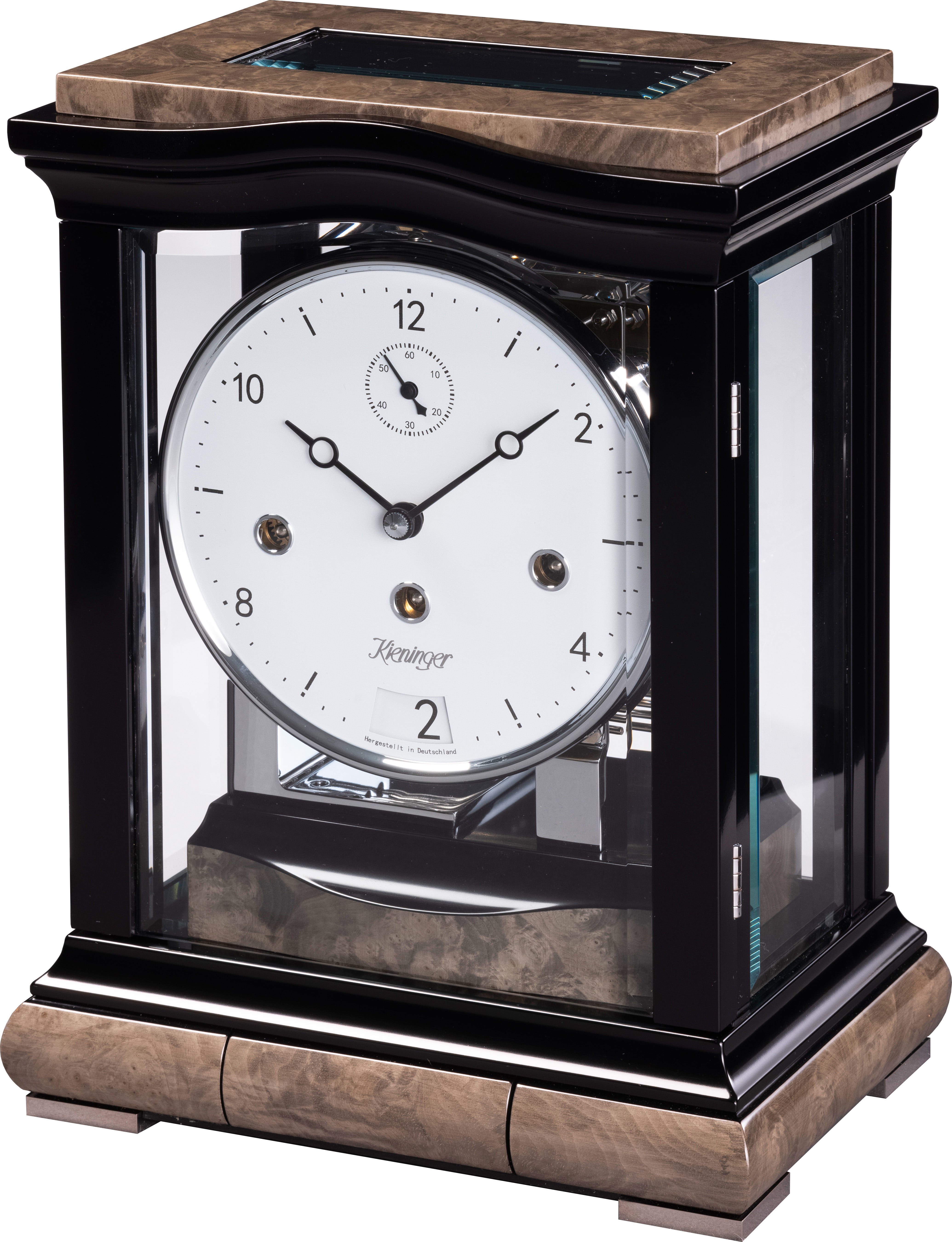 A decorative clock with a white face and black casing, featuring glass panels.