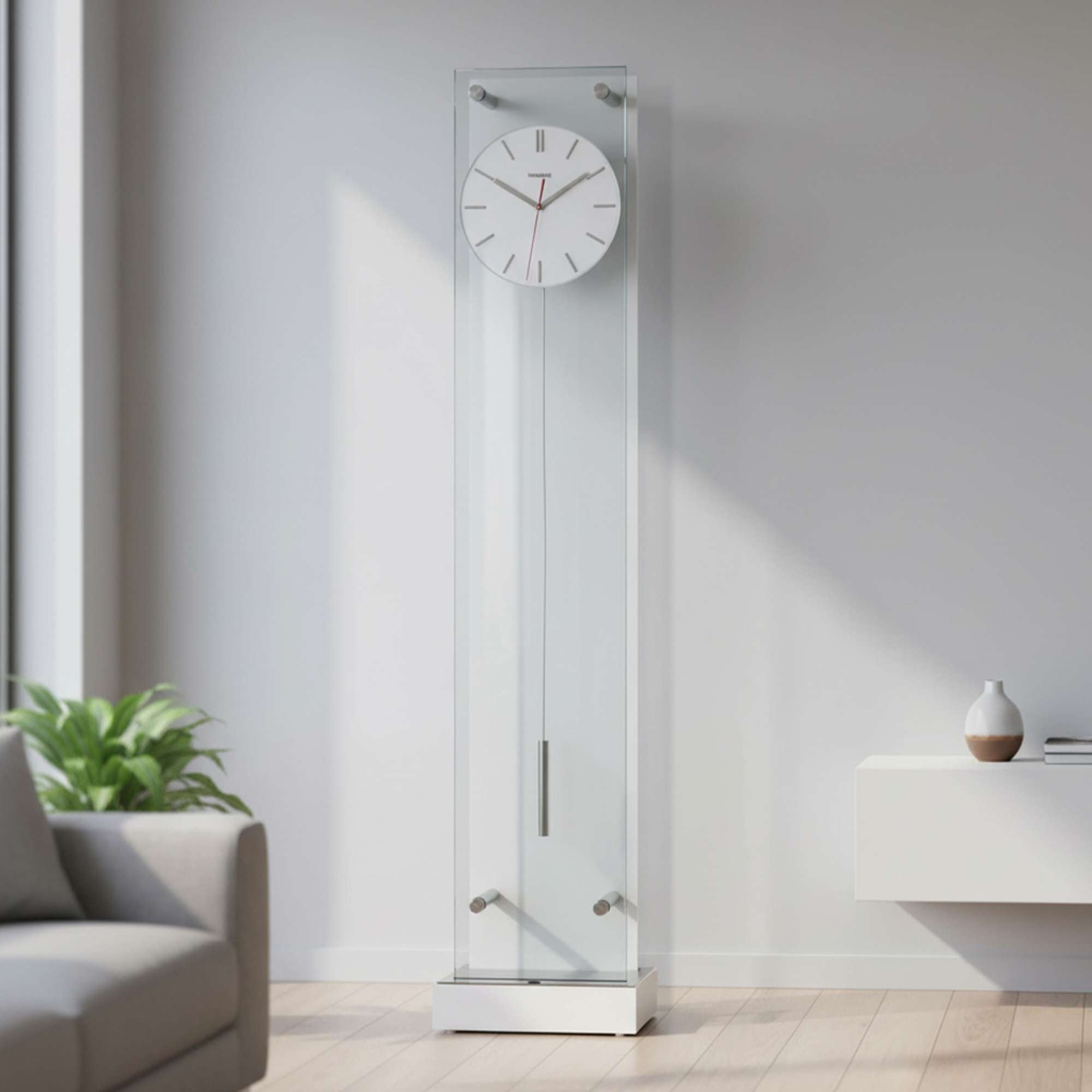 A modern tall clock with a white face displayed against a minimalistic living room backdrop.