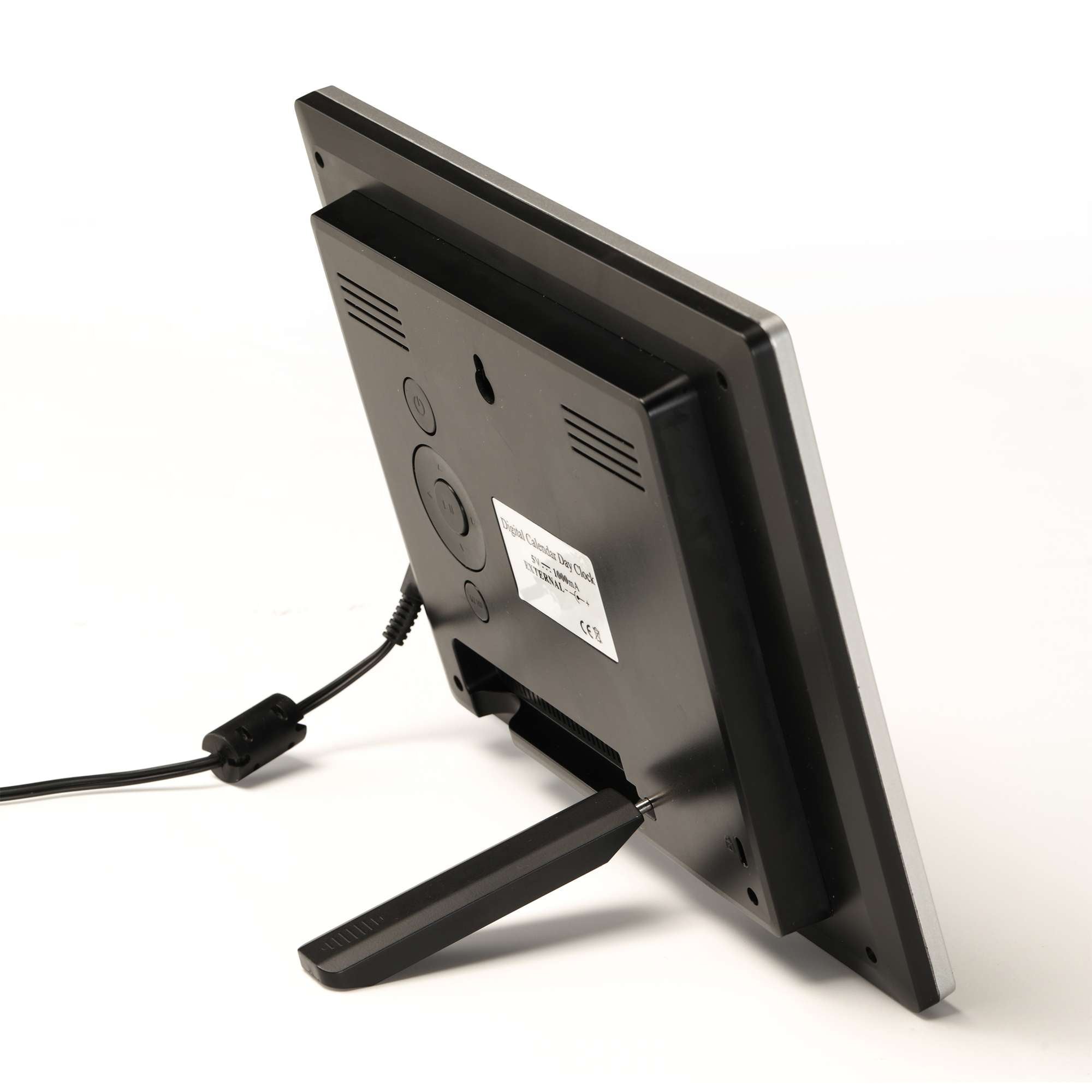 Back view of a computer monitor with a stand and cables