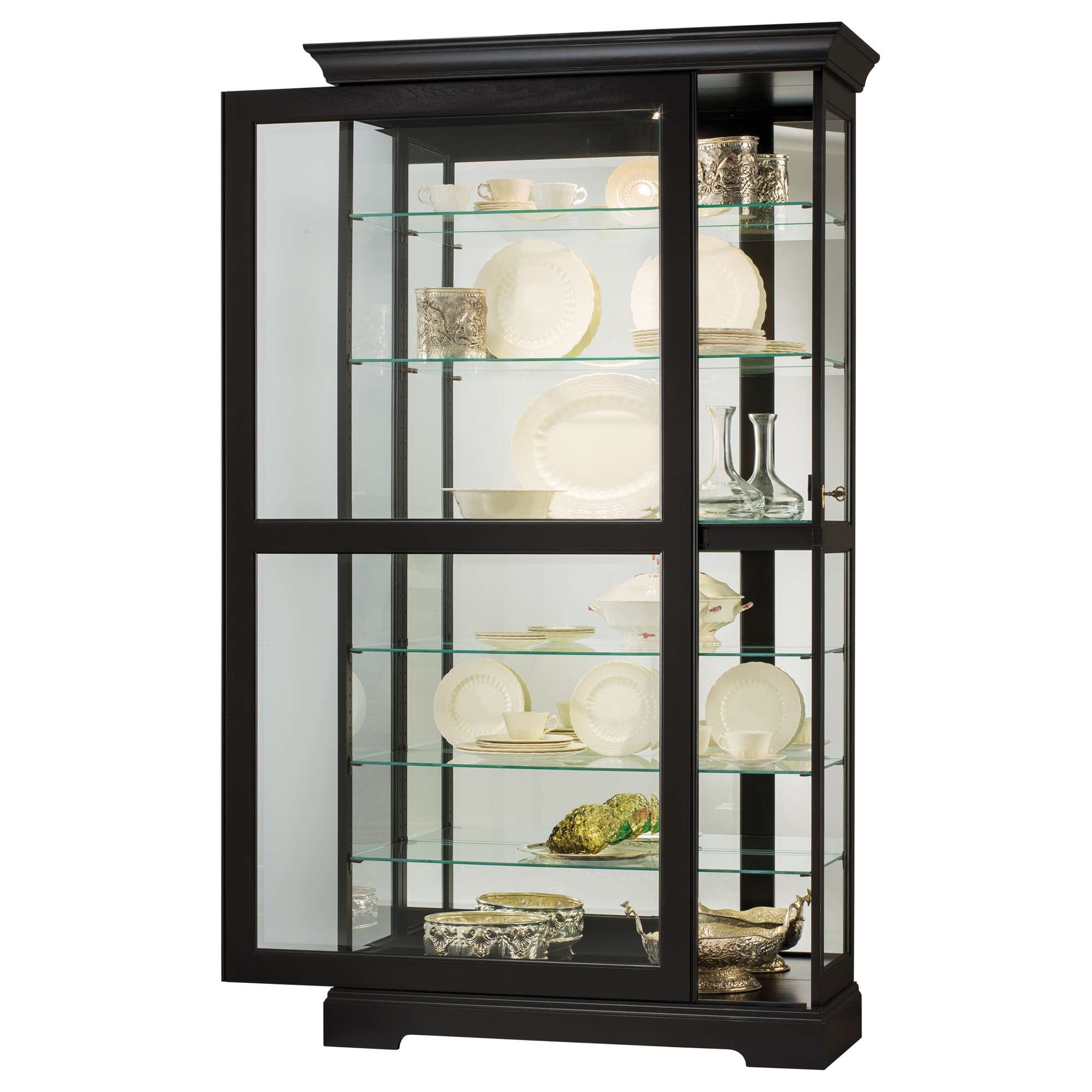 Glass display cabinet showcasing elegant dishware and decor