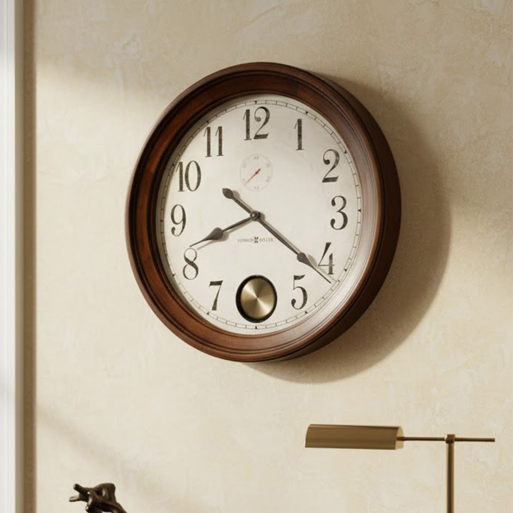 Classic wall clock with a wooden frame, white face, and stylish black hour markers.