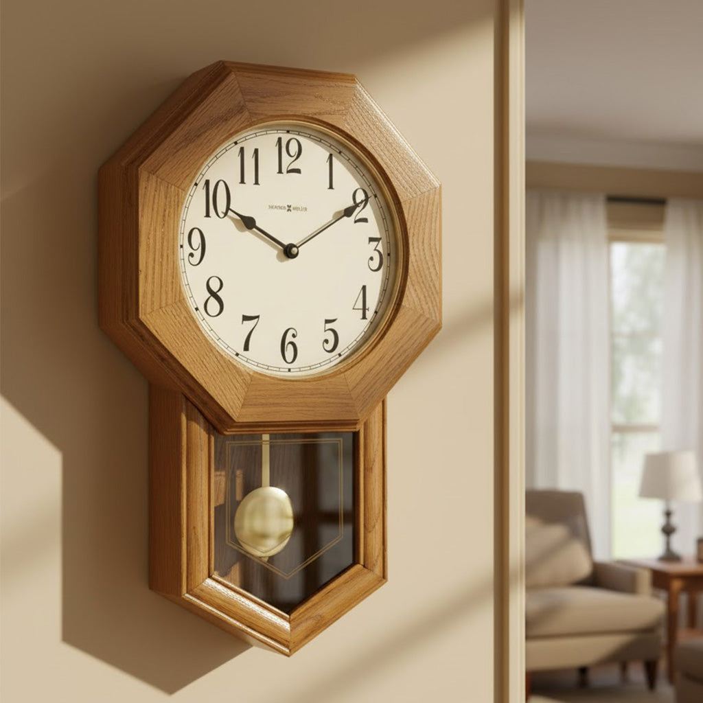 Octagonal wooden wall clock with pendulum, light oak finish, and classic numerical dial.