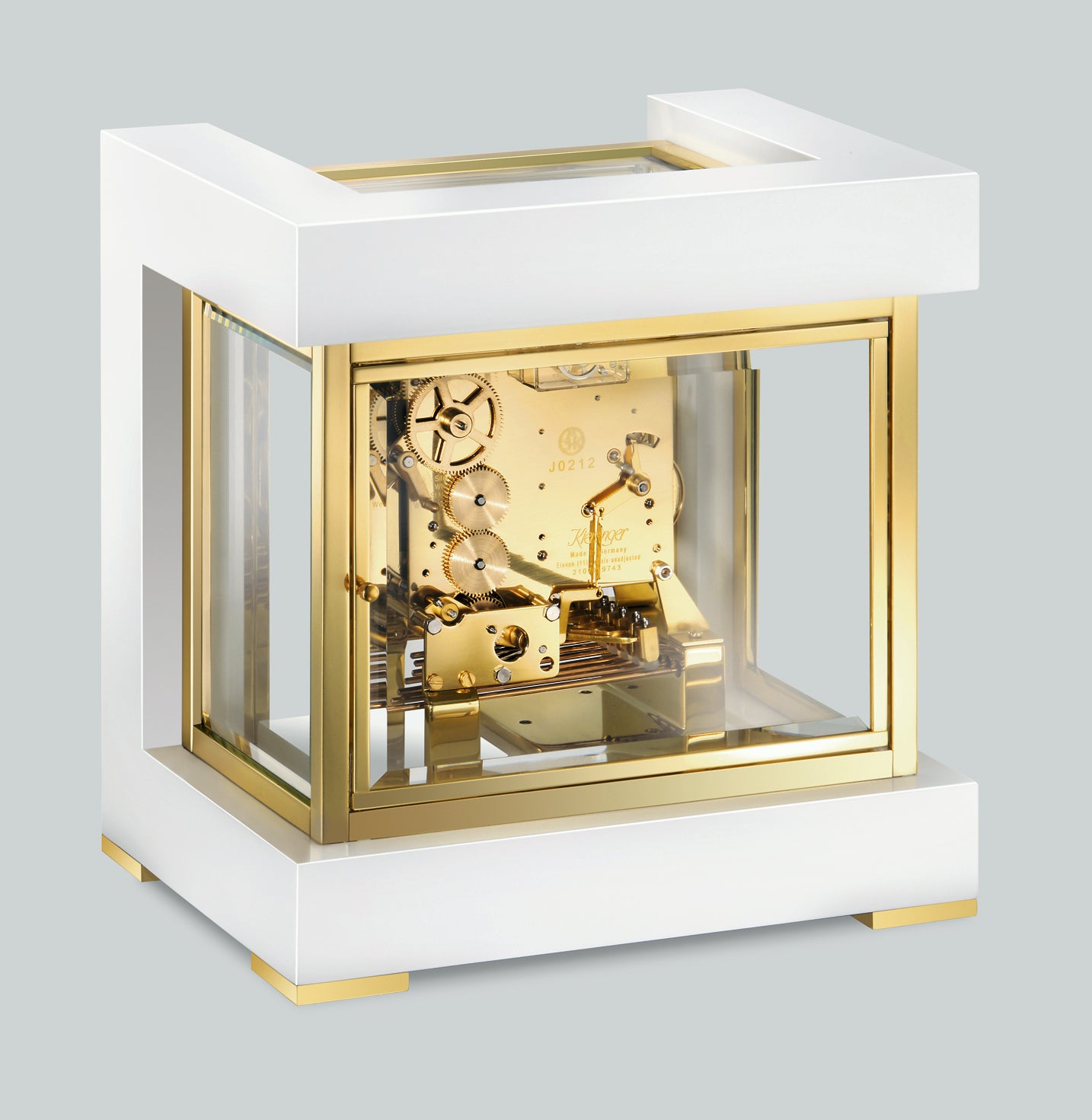 Elegant decorative clock with glass and gold accents