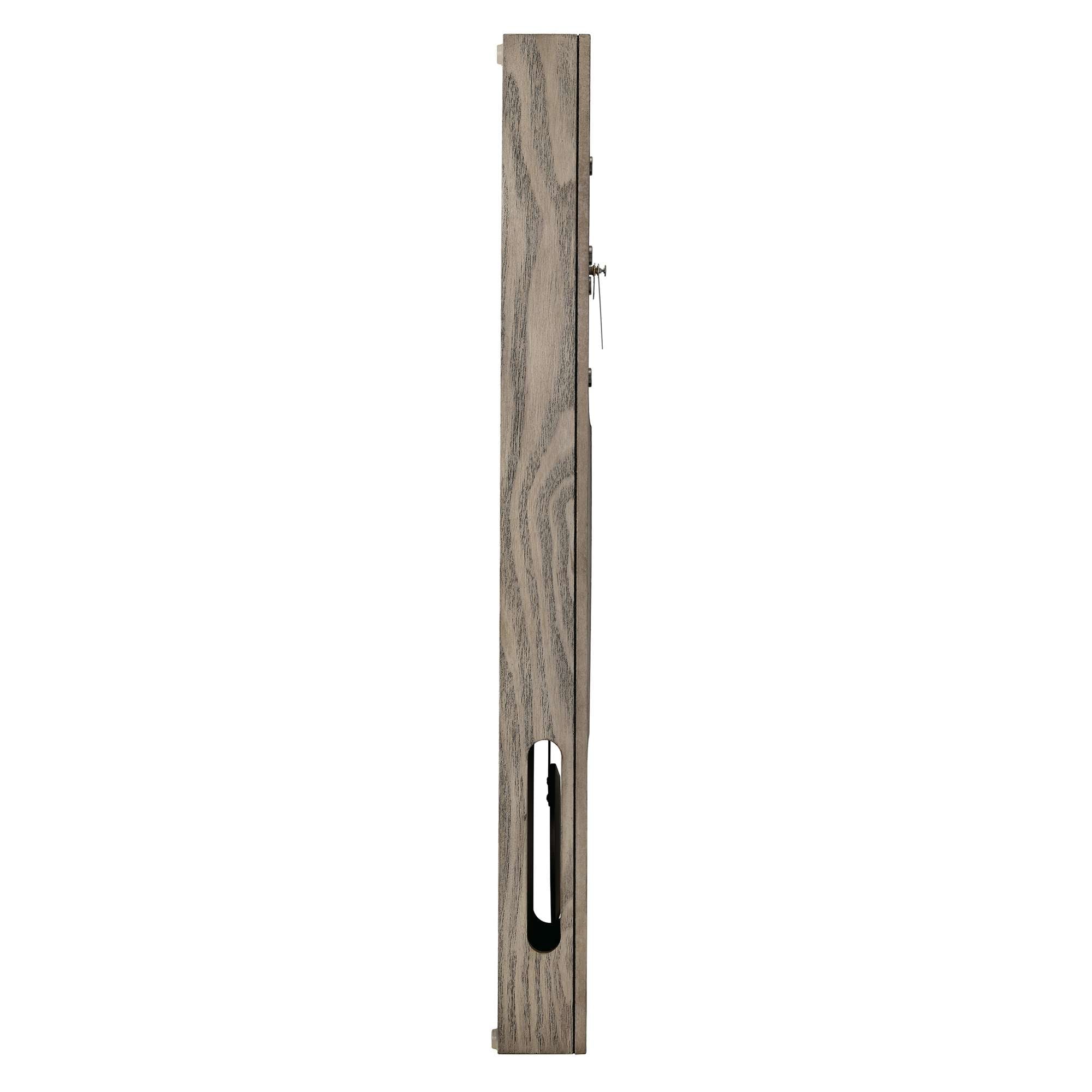 A vertical wooden ruler with a slot cut out, showcasing a textured gray finish.