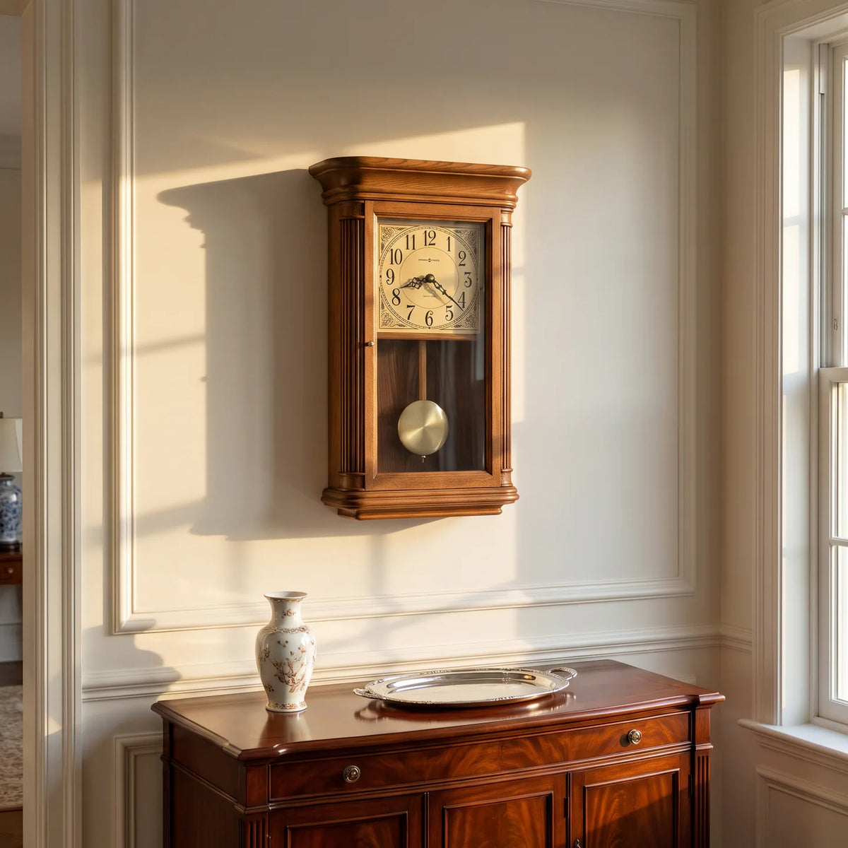 Howard Miller Westbrook Wall Clock, 22-inch, on the wall in a styled room