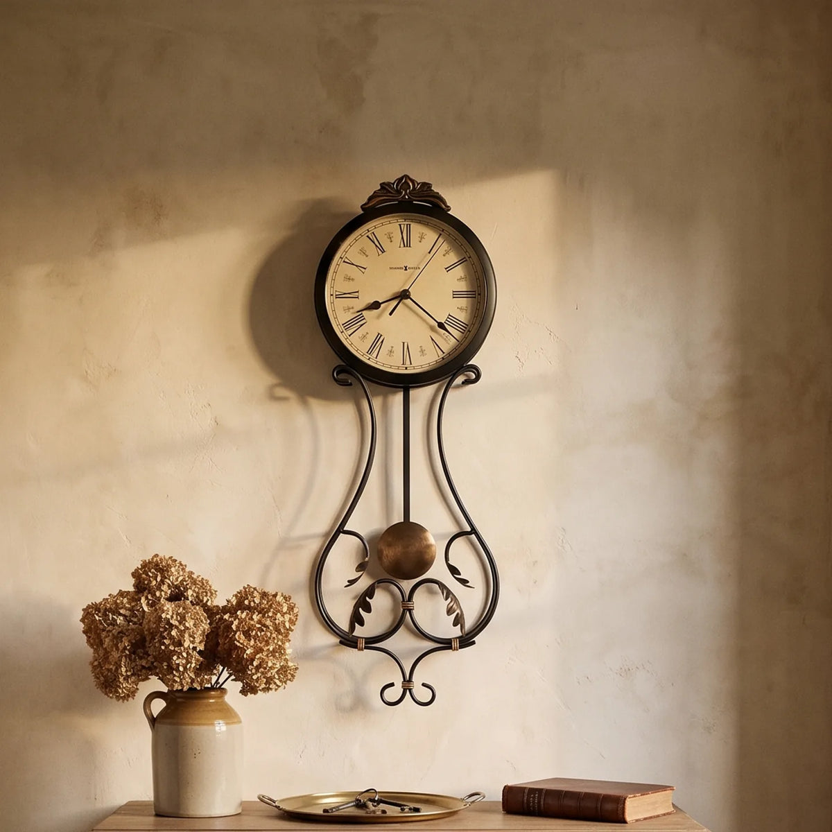 Howard Miller Paulina Wall Clock, 24-inch, on the wall in a styled room