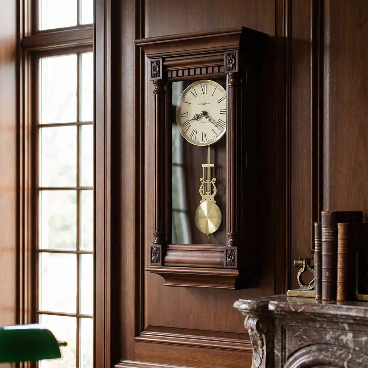 Howard Miller Lewisburg Wall Clock, 27-inch, on the wall in a styled room