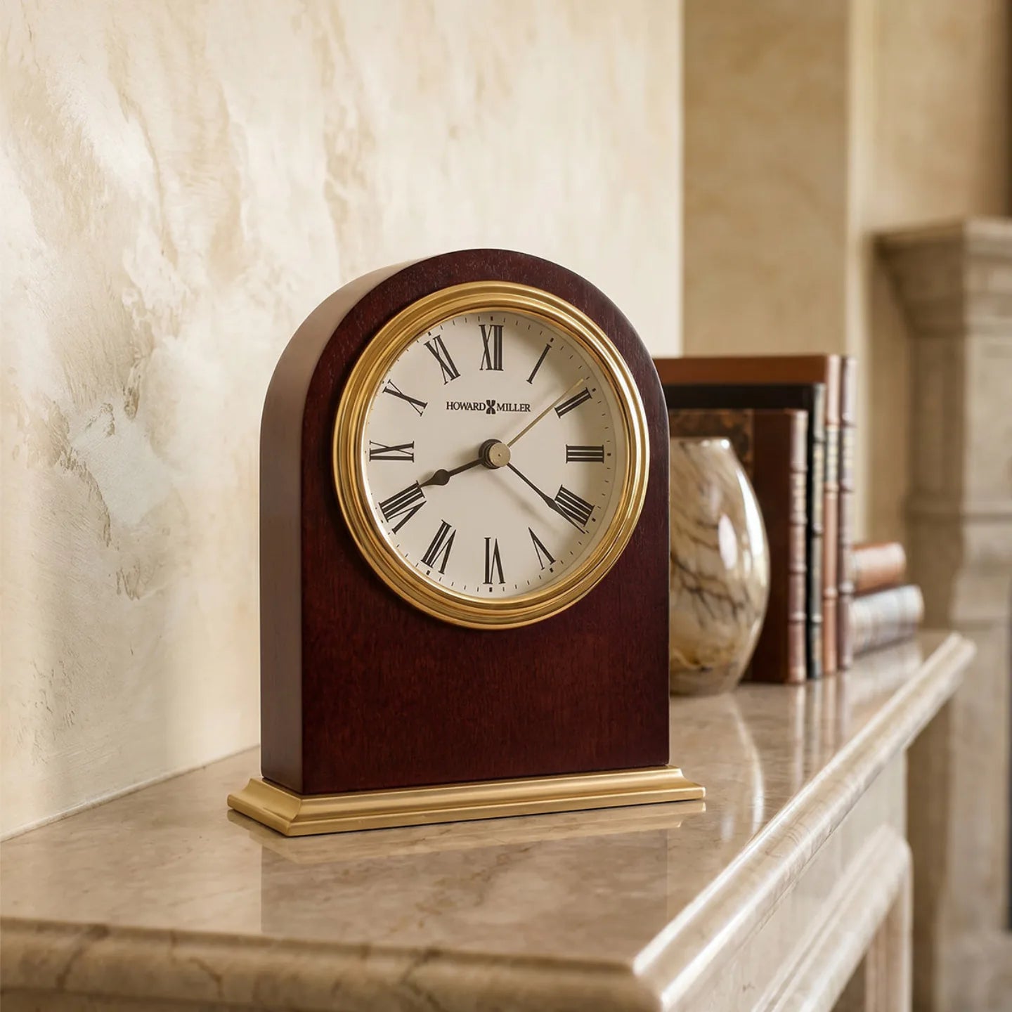 Howard Miller Craven Tabletop Clock, 5-inch, on a shelf in a styled room
