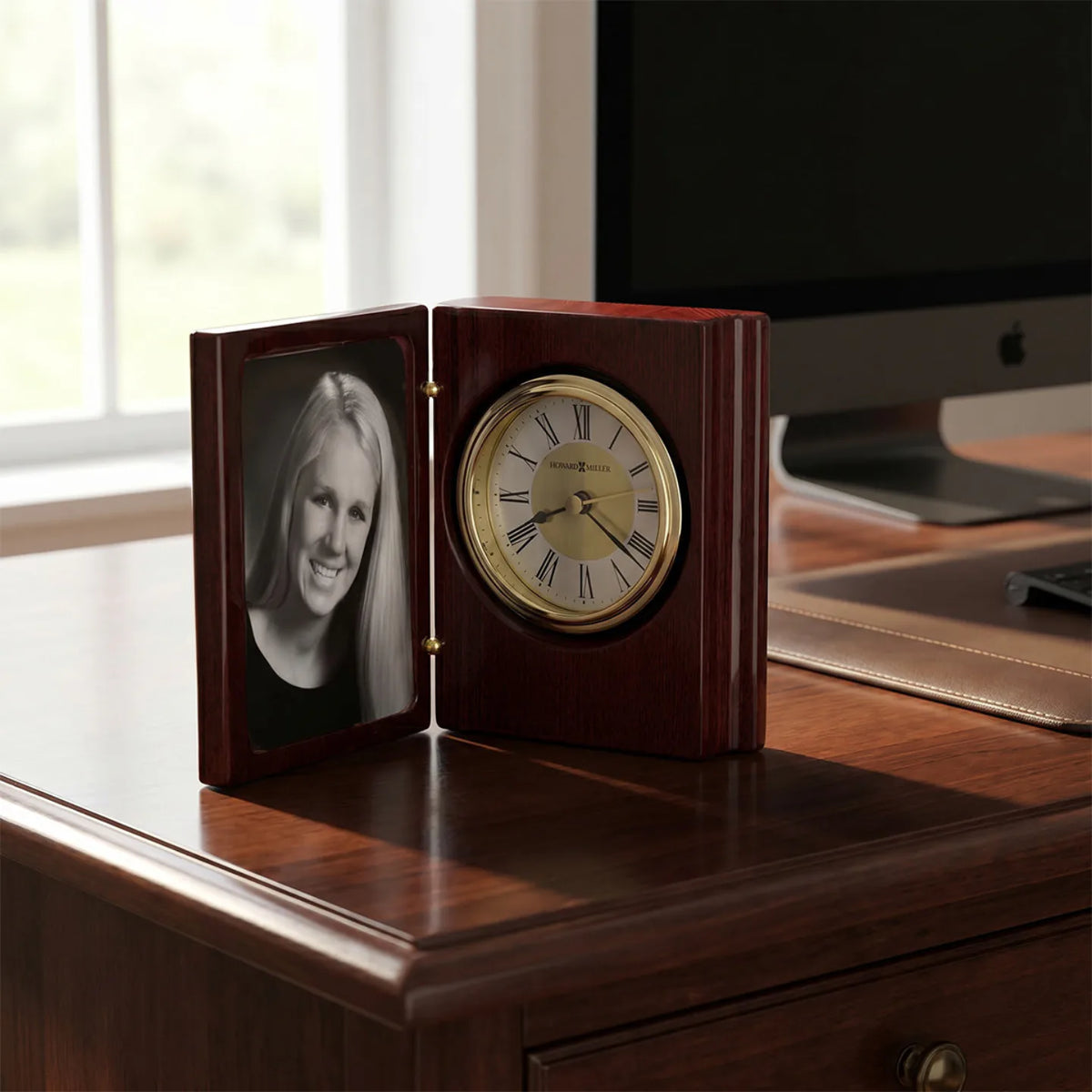 Howard Miller Portrait Book Tabletop Clock, 5-inch, on a shelf in a styled room