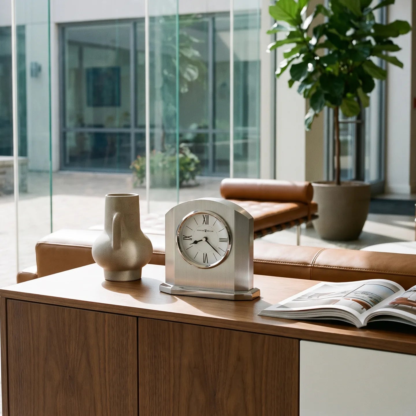 Howard Miller Lincoln Tabletop Clock, 6-inch, on a shelf in a styled room