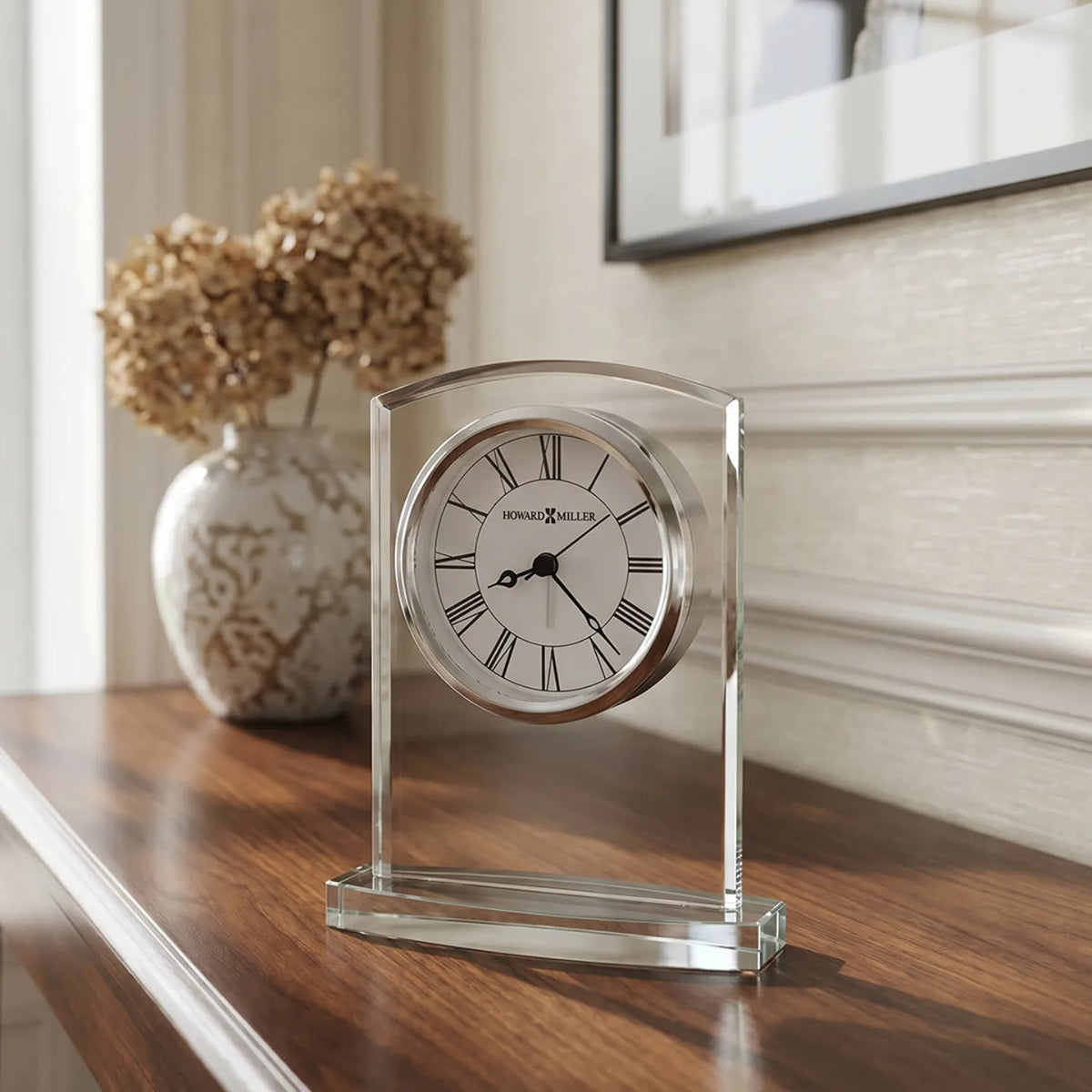 Howard Miller Talbot Tabletop Clock, 7-inch, on a shelf in a styled room