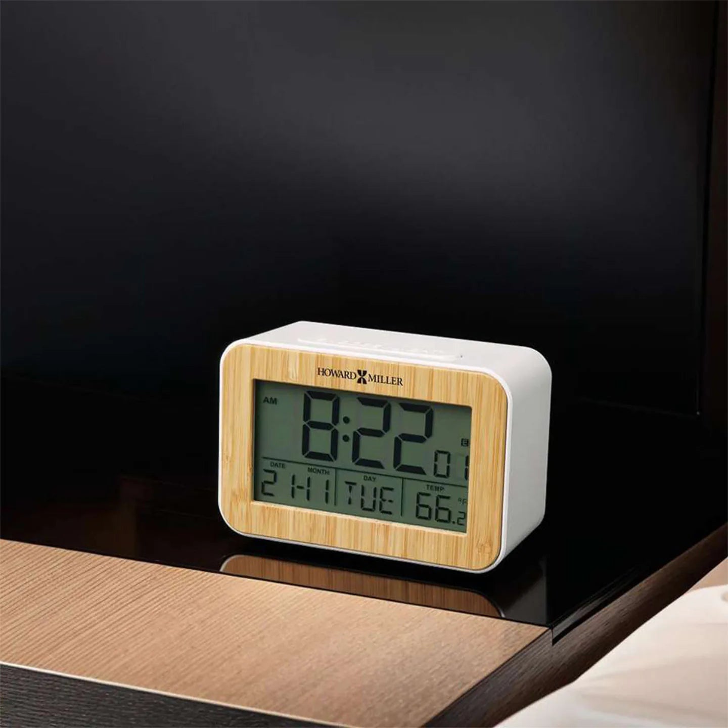 Howard Miller Bamboo Box Alarm Clock, 4-inch, on a shelf in a styled room