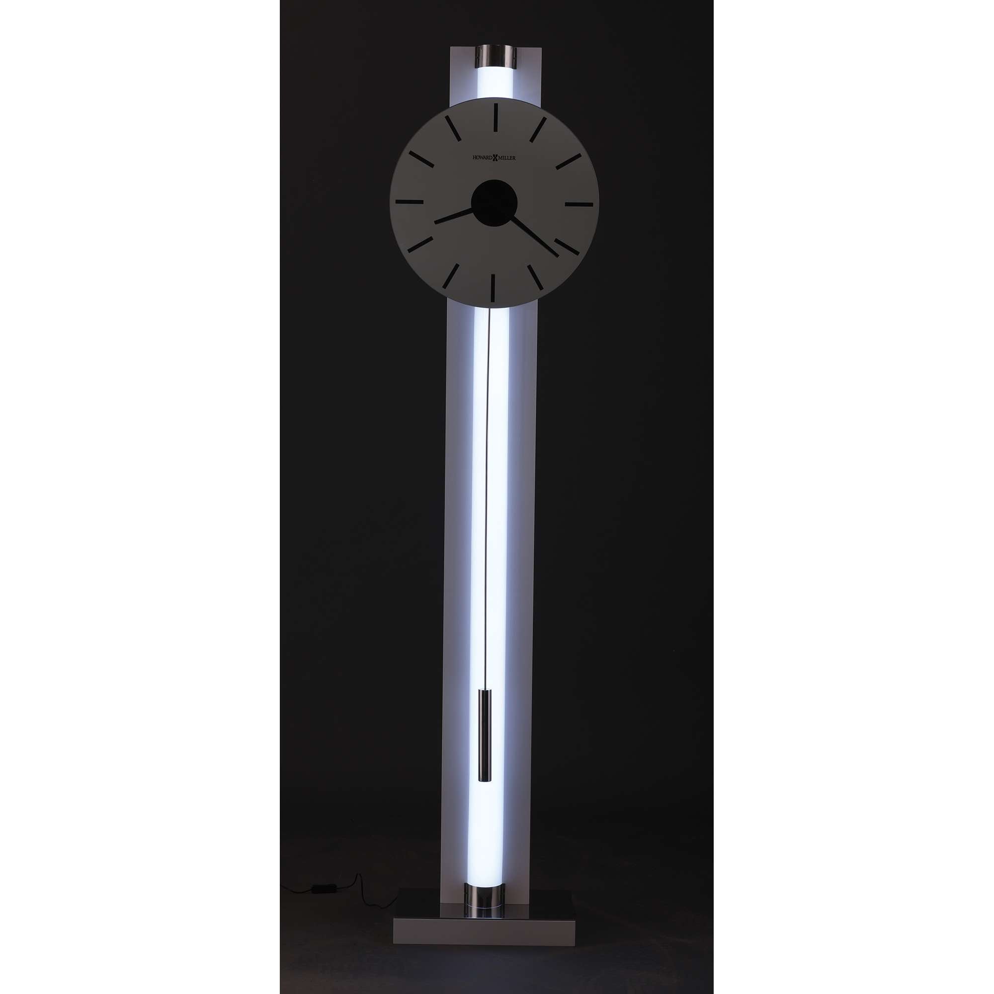 Modern floor clock with a circular face and illuminated body