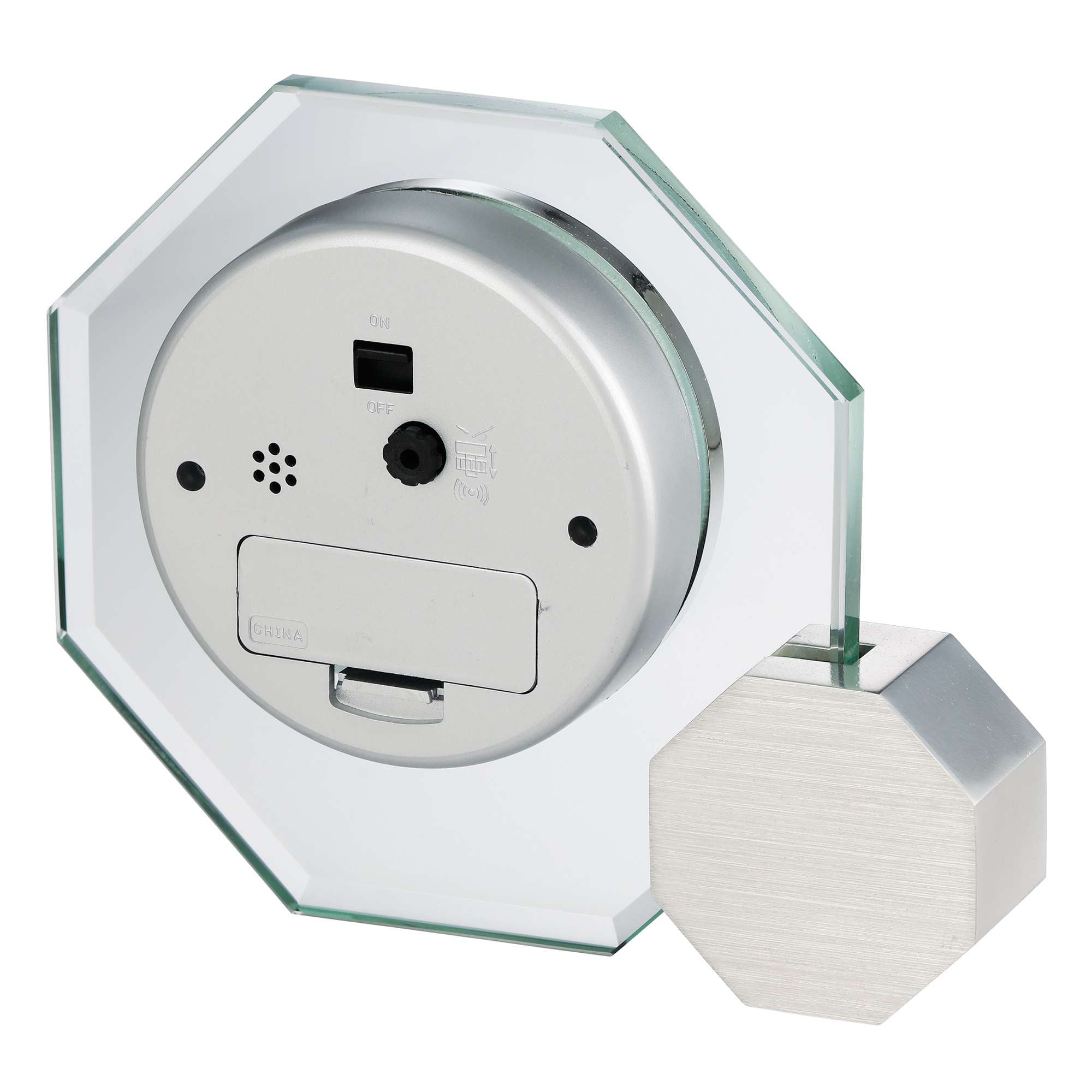 A silver and glass octagonal wall clock with a modern design.