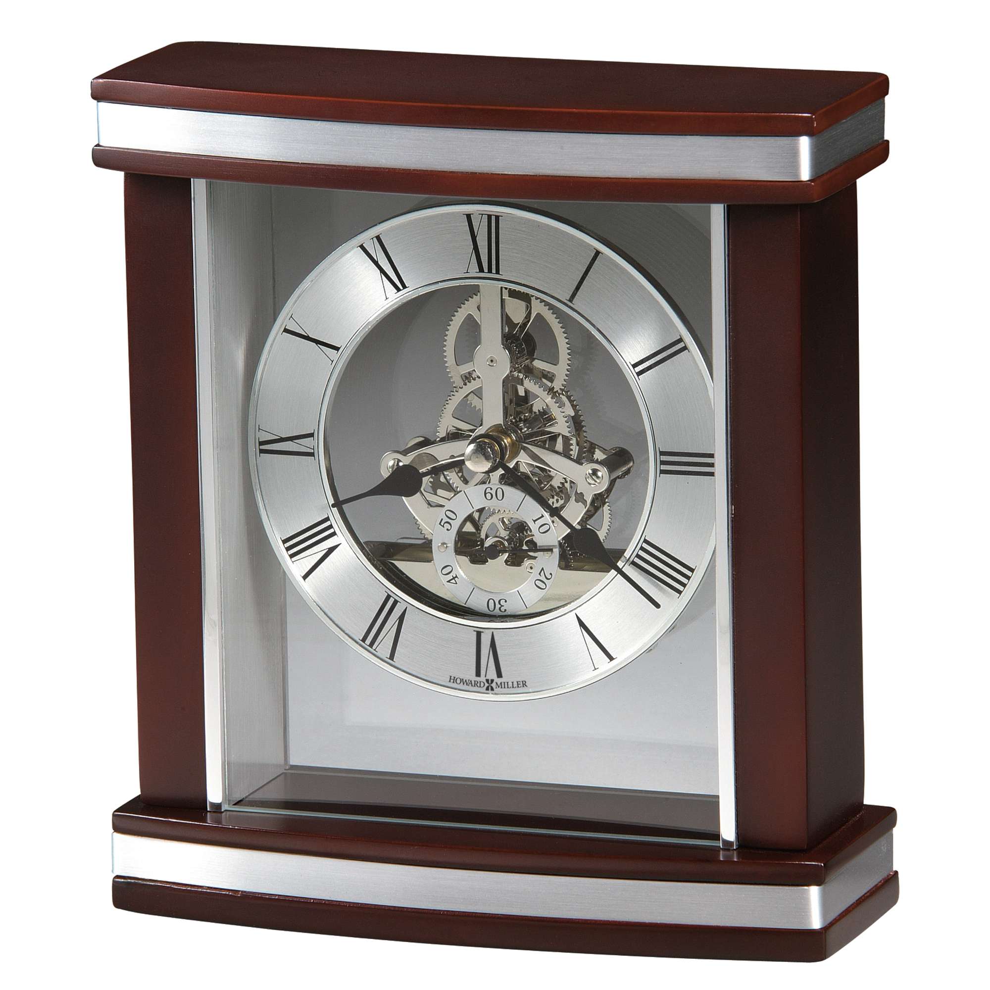 A decorative wooden mantel clock with a silver face and Roman numerals.
