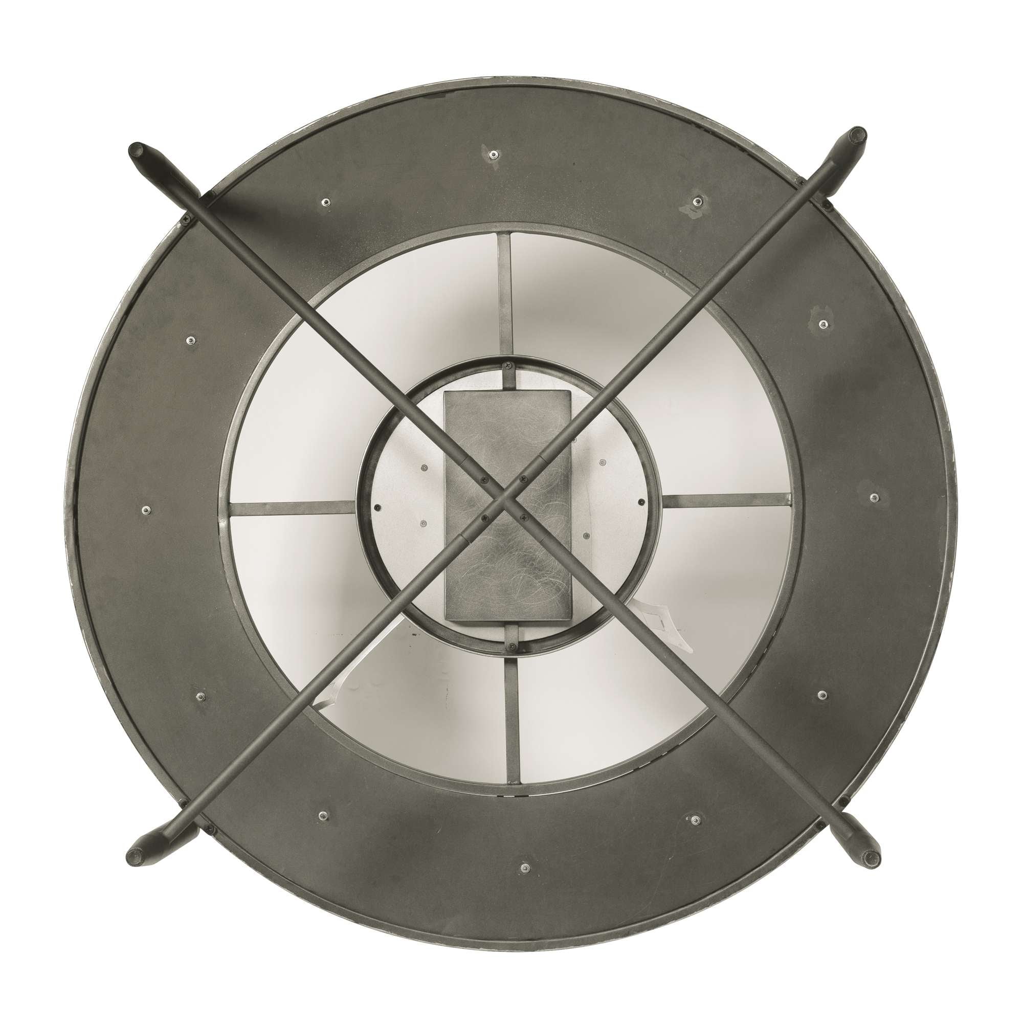 Top view of a round metal fan blade with a cross pattern.