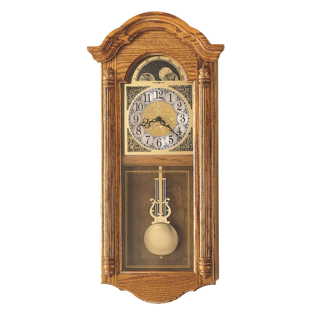 Wall-mounted antique clock with a pendulum