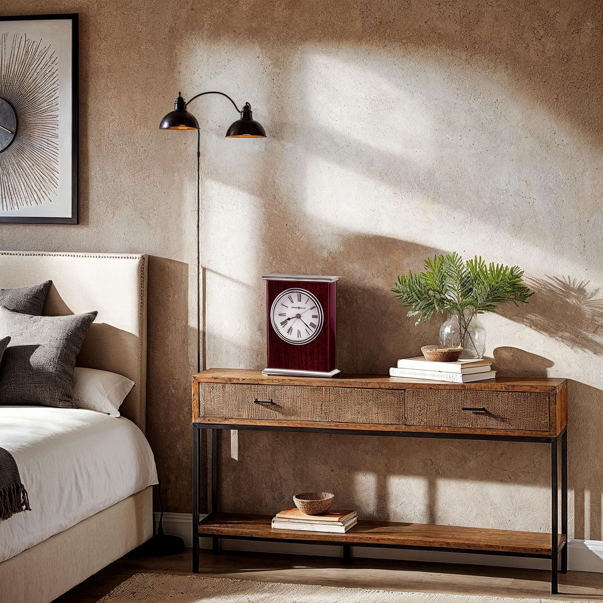 Cozy bedroom corner with a wooden console table, a table lamp, and a red clock.