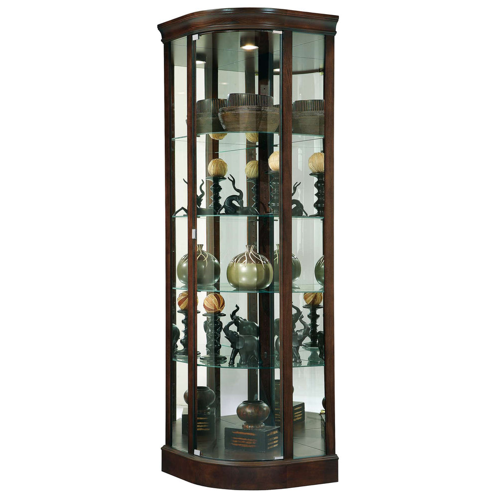 Curved wooden display cabinet with glass shelves showcasing decorative objects