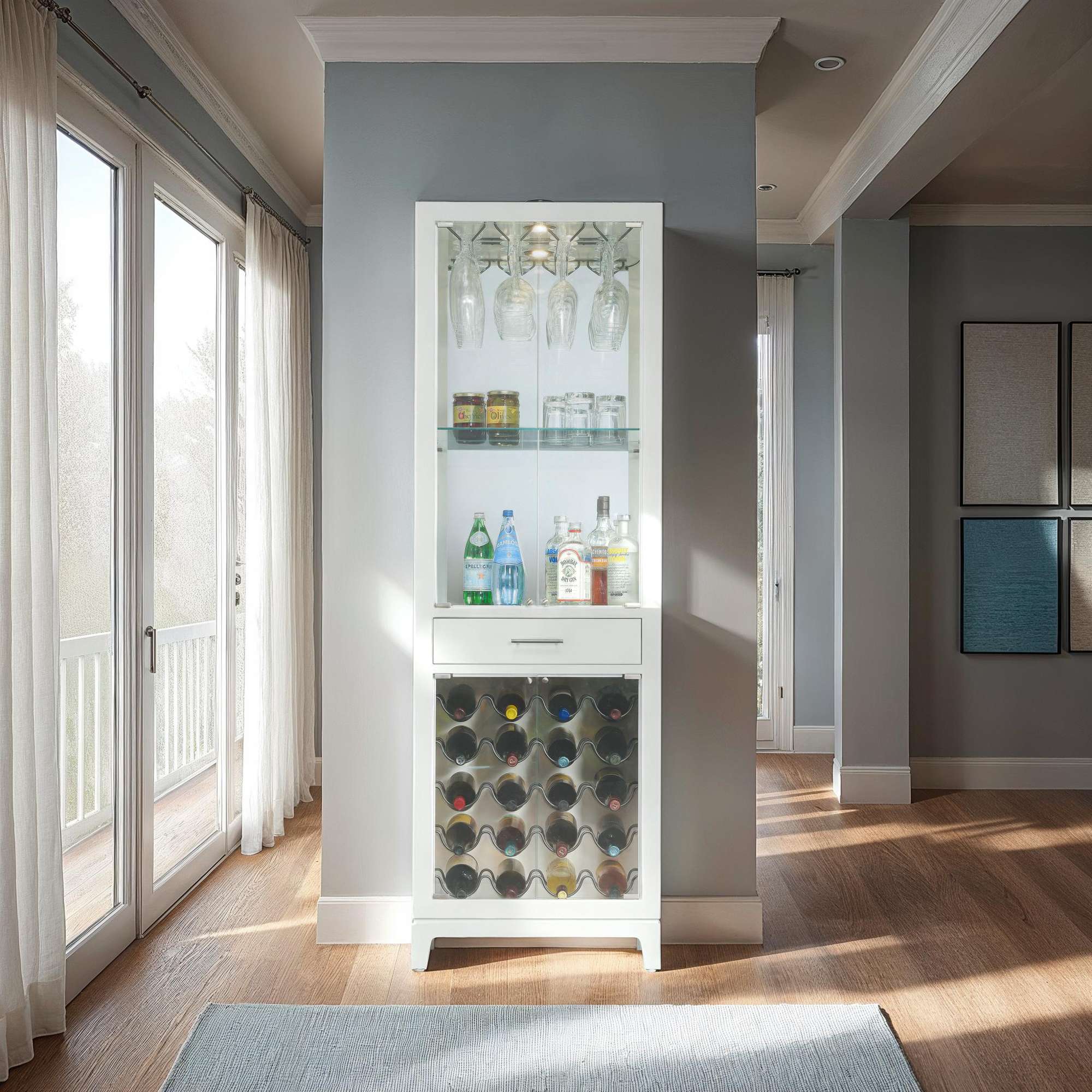 A stylish home bar cabinet with bottles and glasses illuminated by natural light.