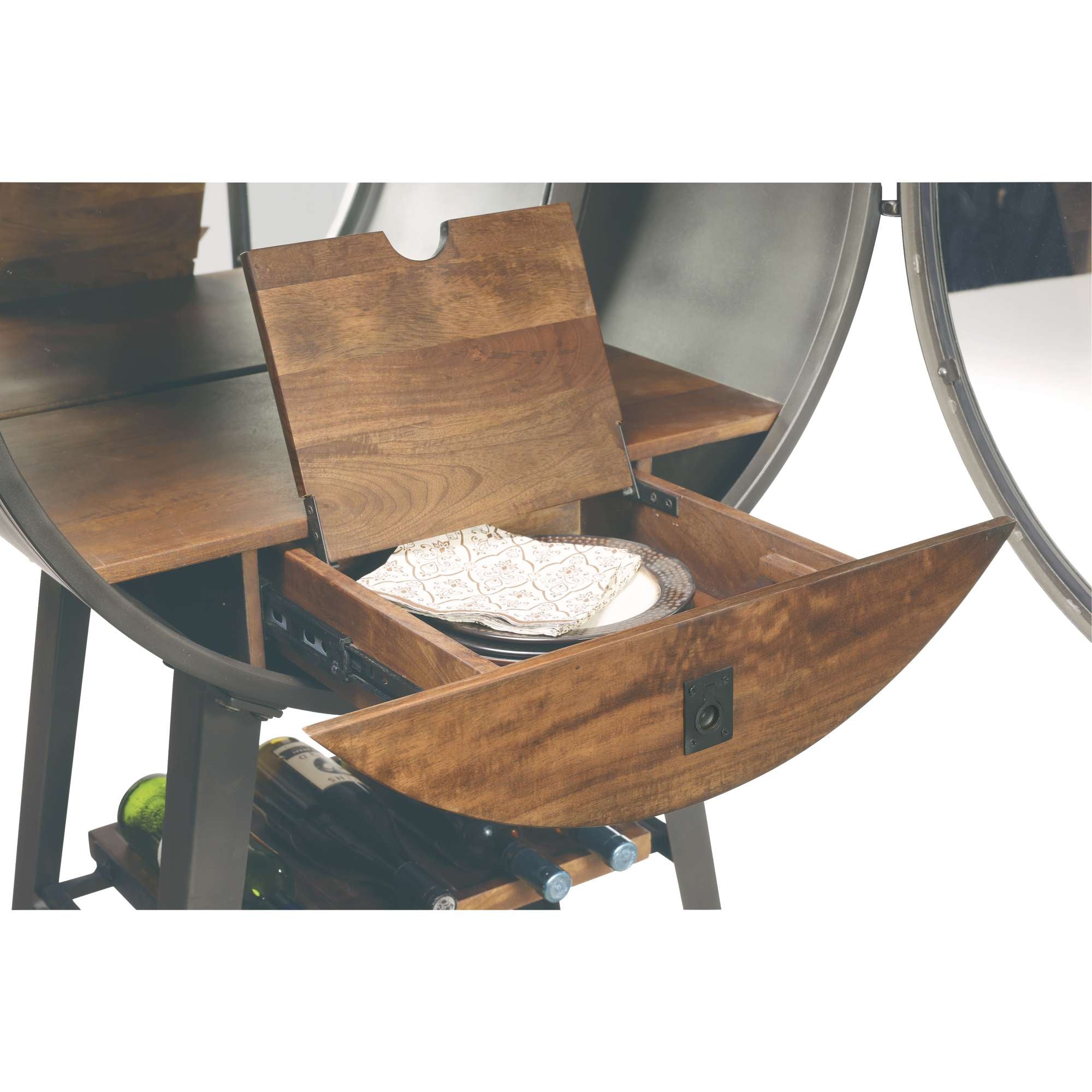 A wooden drawer of a stylish storage cart holding decorative plates.