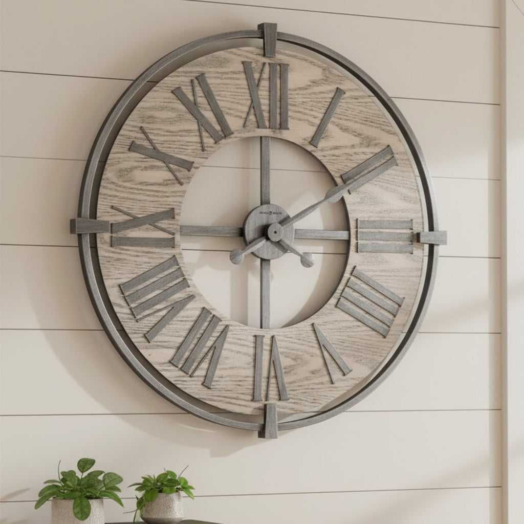 Rustic round wall clock in grey wood with Roman numerals and metal accents, perfect for home decor.