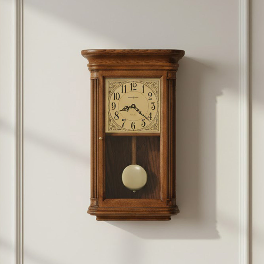 Elegant wooden wall clock with pendulum, cream face, intricate design, vintage style, perfect for home decor.