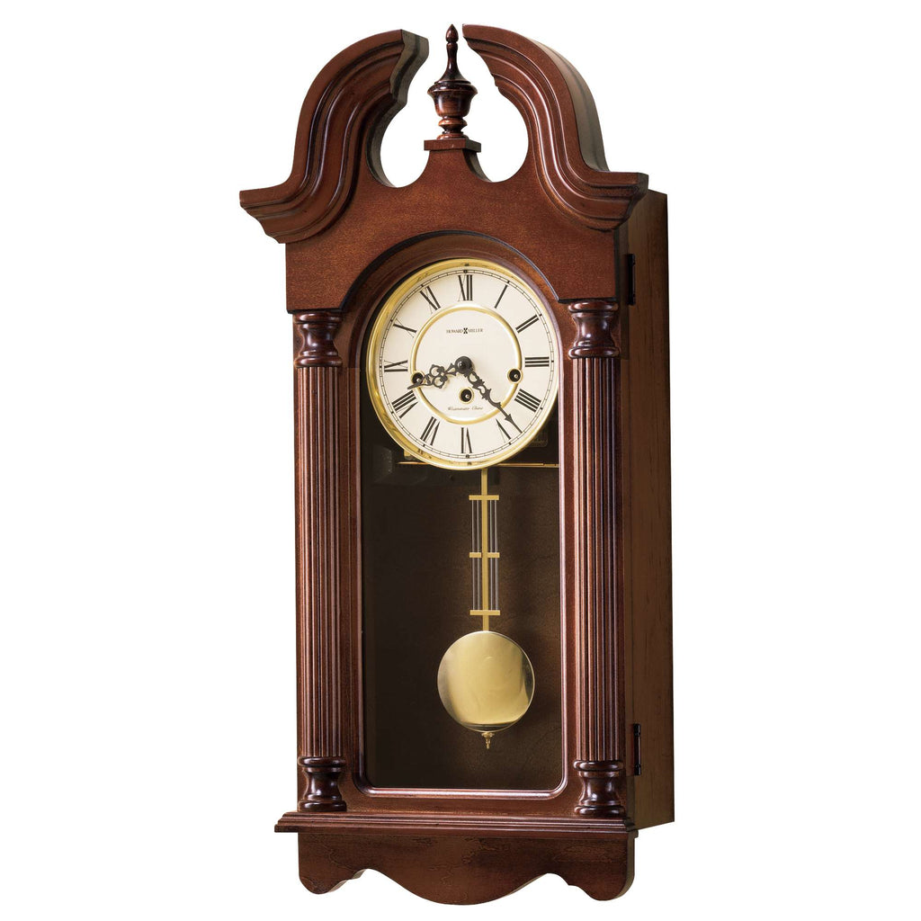A vintage wall clock with a wooden frame and pendulum, featuring a classic design and gold accents.