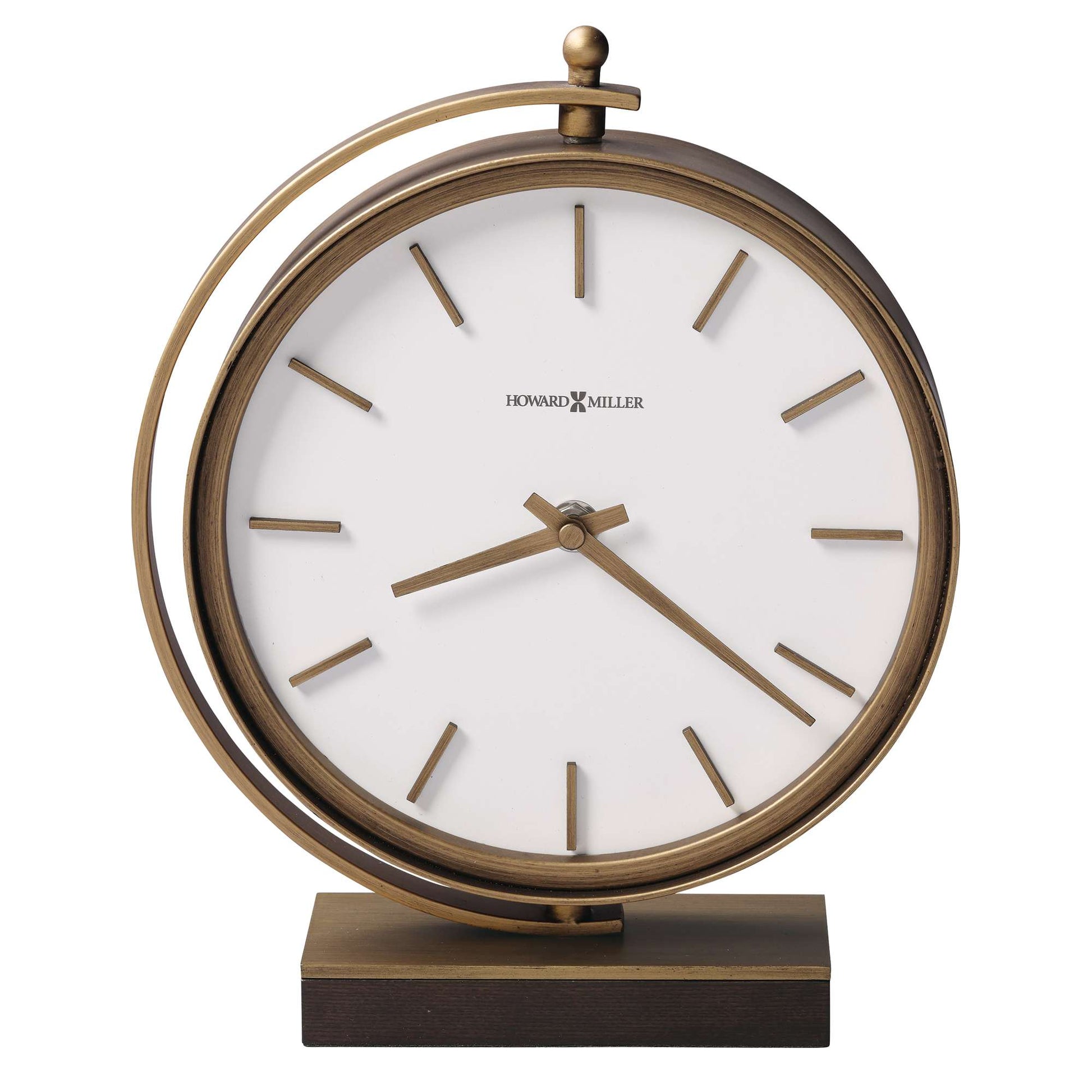 A vintage-style bronze desk clock with a white face and minimalist hour markers.