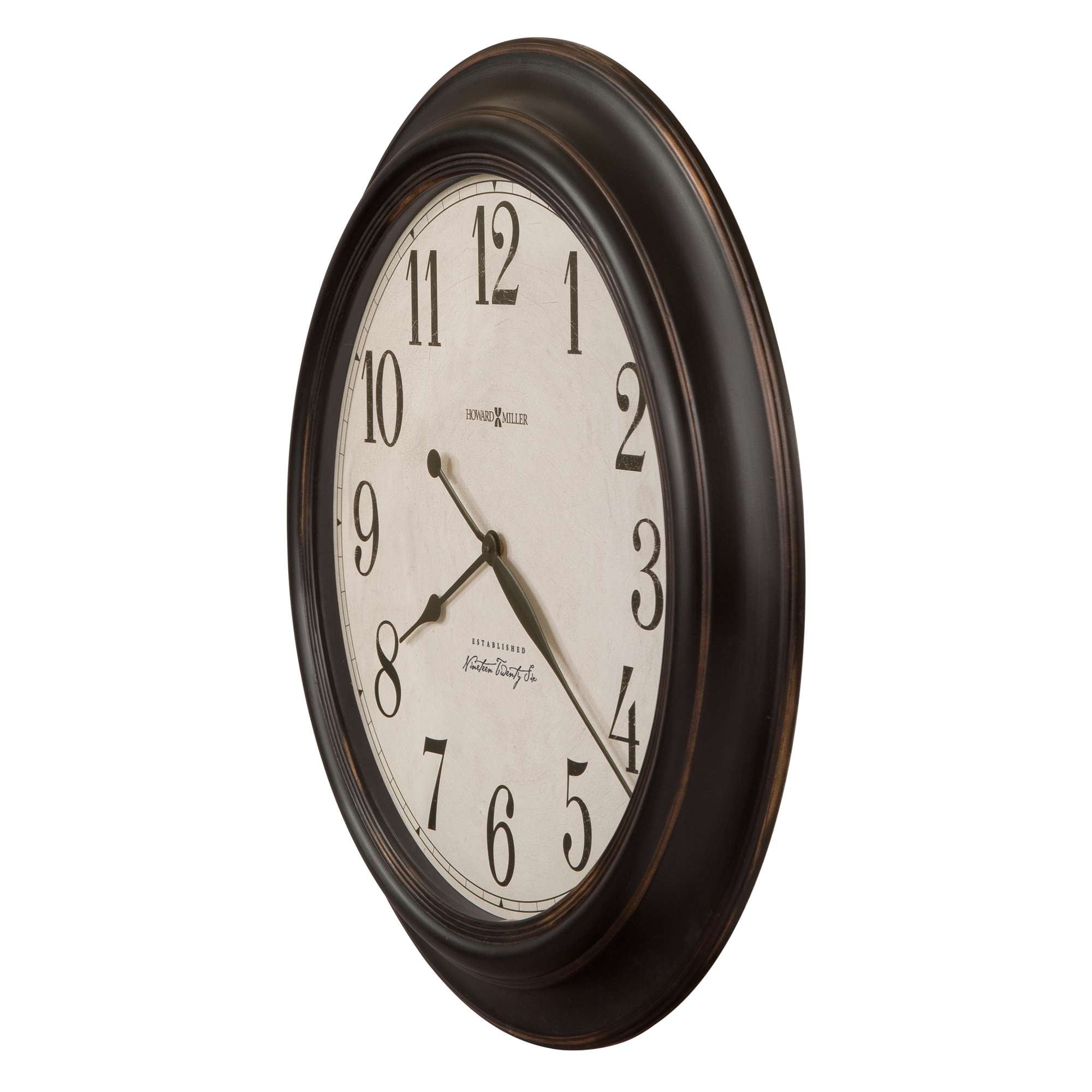 Wall clock with a round black frame and white face