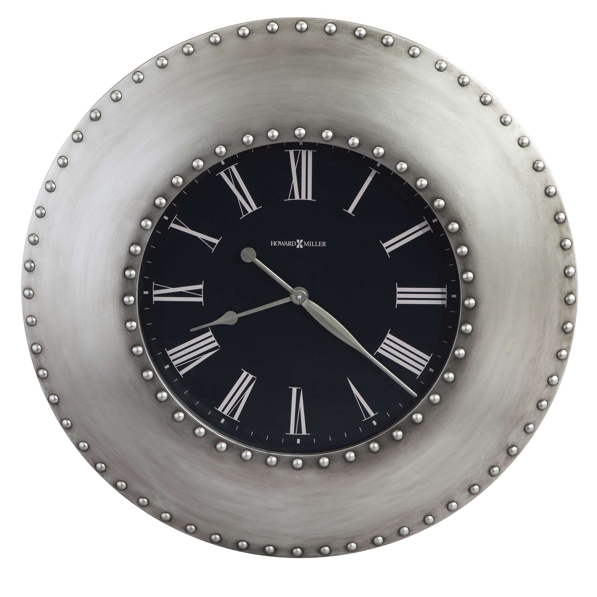 Round wall clock with a black face and Roman numerals, surrounded by a silver studded frame.
