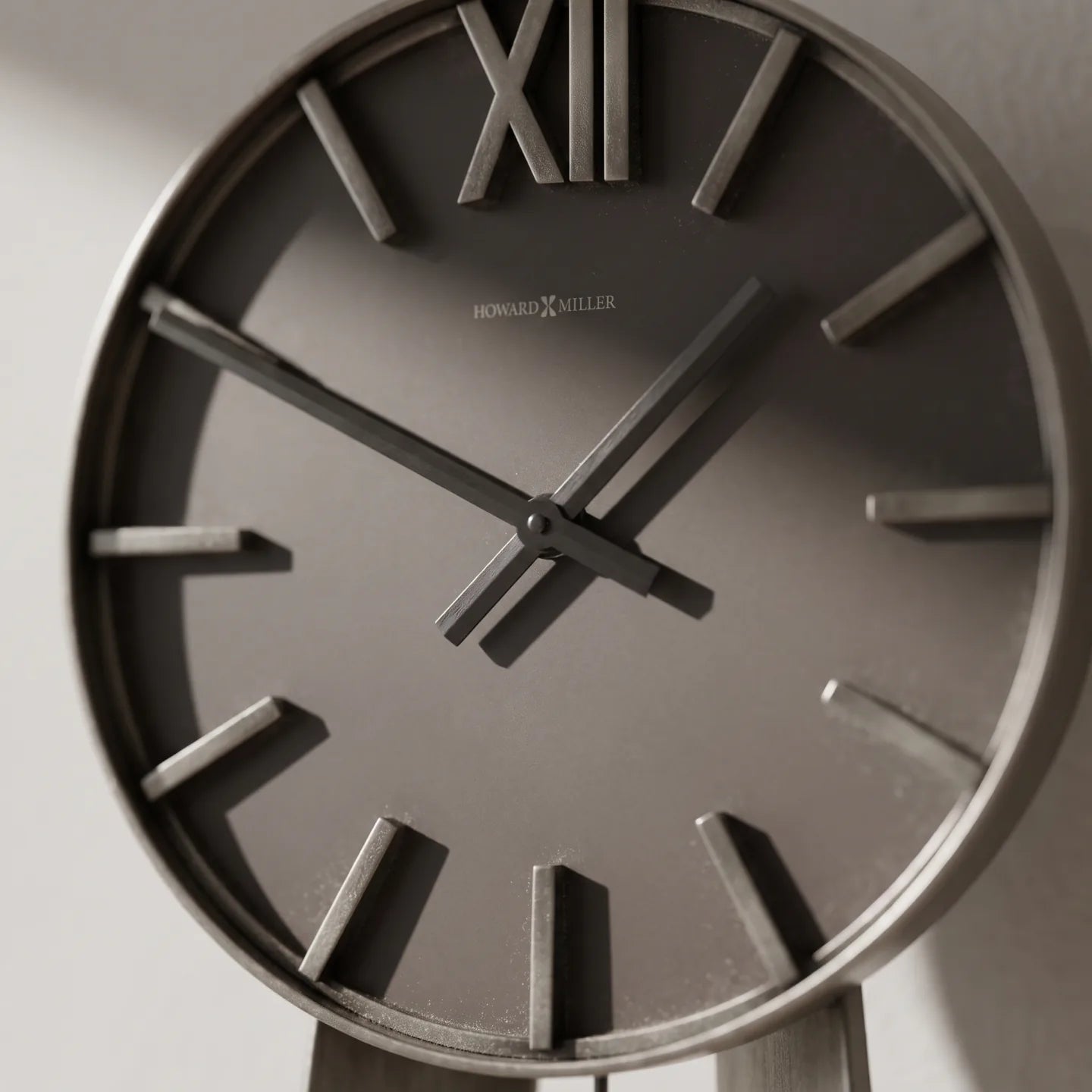 Howard Miller Odie Grandfather Clock, close-up of the dial and finish detail