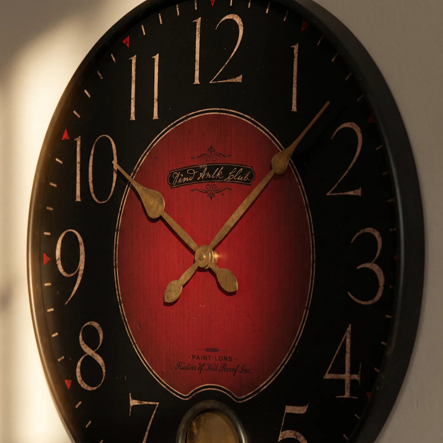 Howard Miller Harmon Wall Clock, close-up of the dial and finish detail