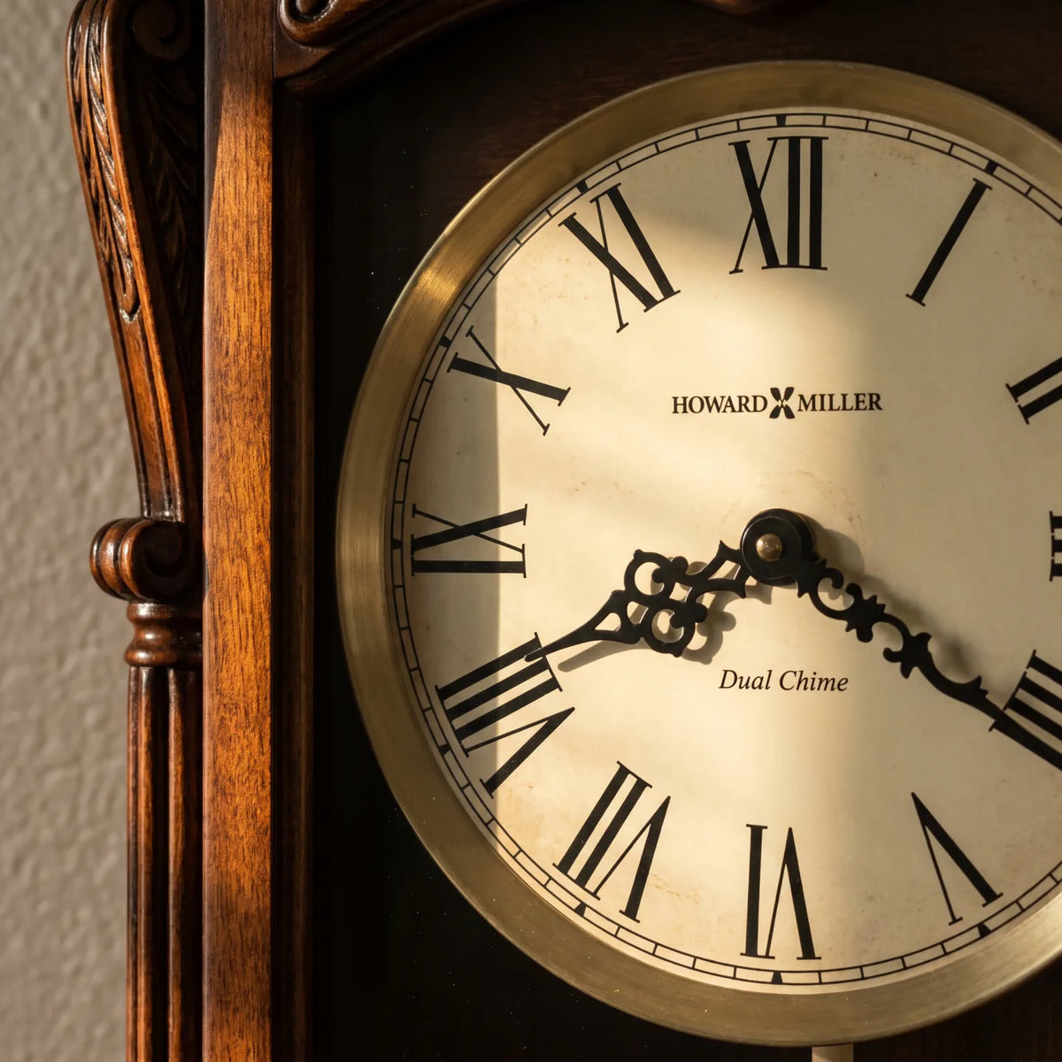 Howard Miller Henderson Wall Clock, close-up of the dial and finish detail