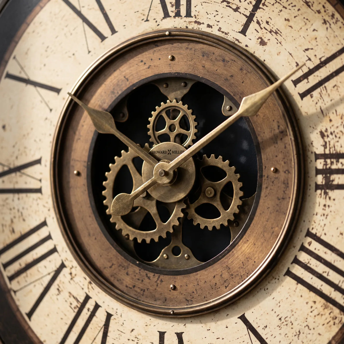 Howard Miller Brass Works Wall Clock, close-up of the dial and finish detail
