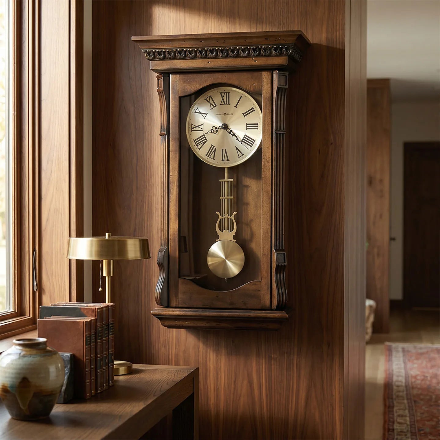 Howard Miller Agatha Wall Clock, 26-inch, on the wall in a styled room