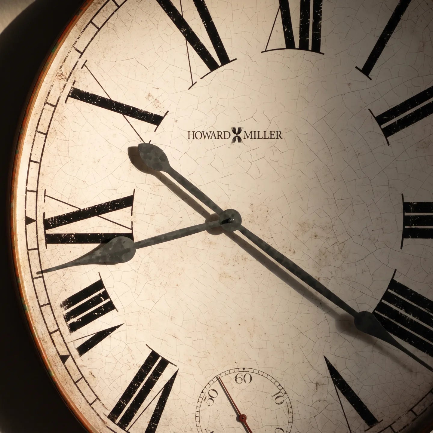 Howard Miller Gallery Pocket Watch II Wall Clock, close-up of the dial and finish detail