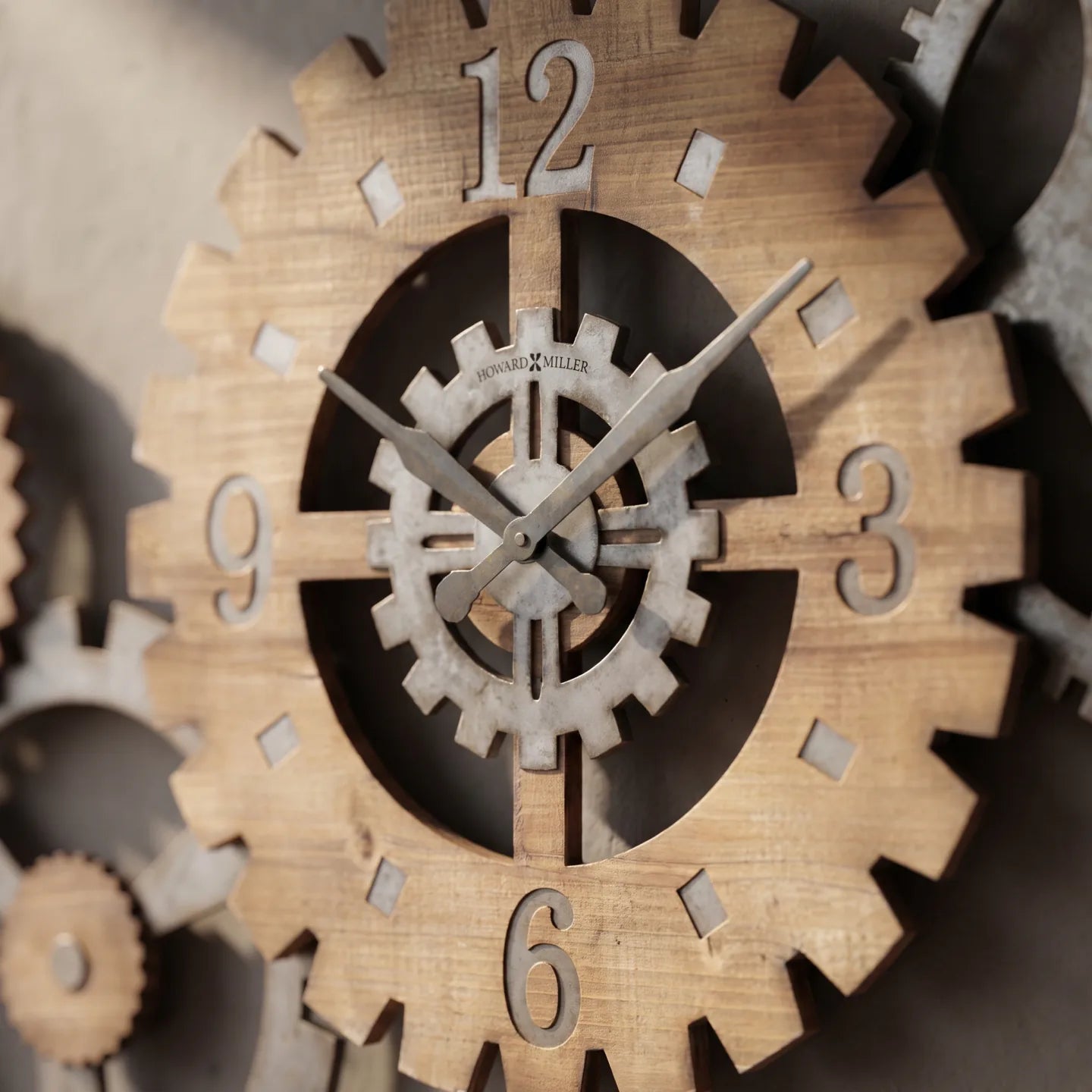 Howard Miller Cogwheel III Gallery Wall, close-up of the dial and finish detail