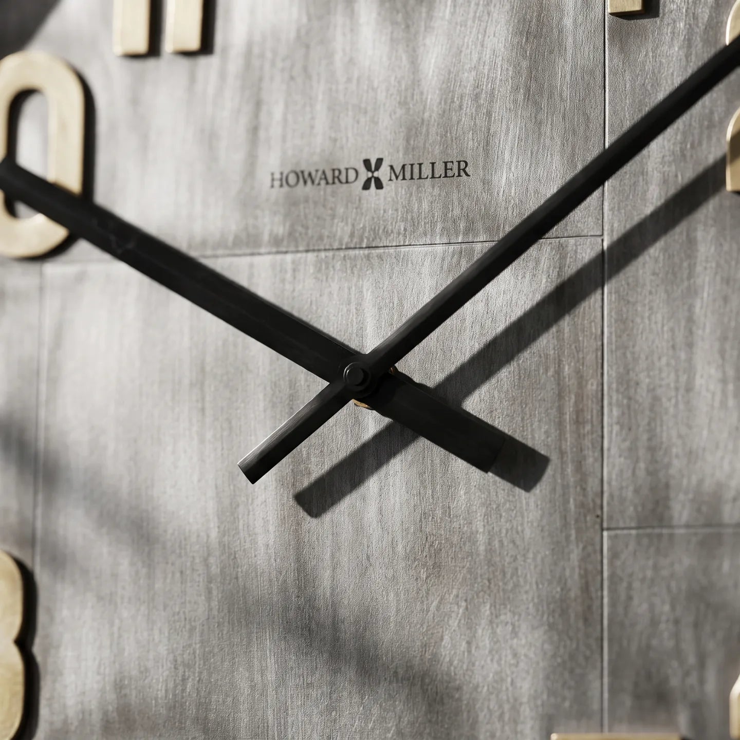 Howard Miller Bender Gallery Wall Clock, close-up of the dial and finish detail