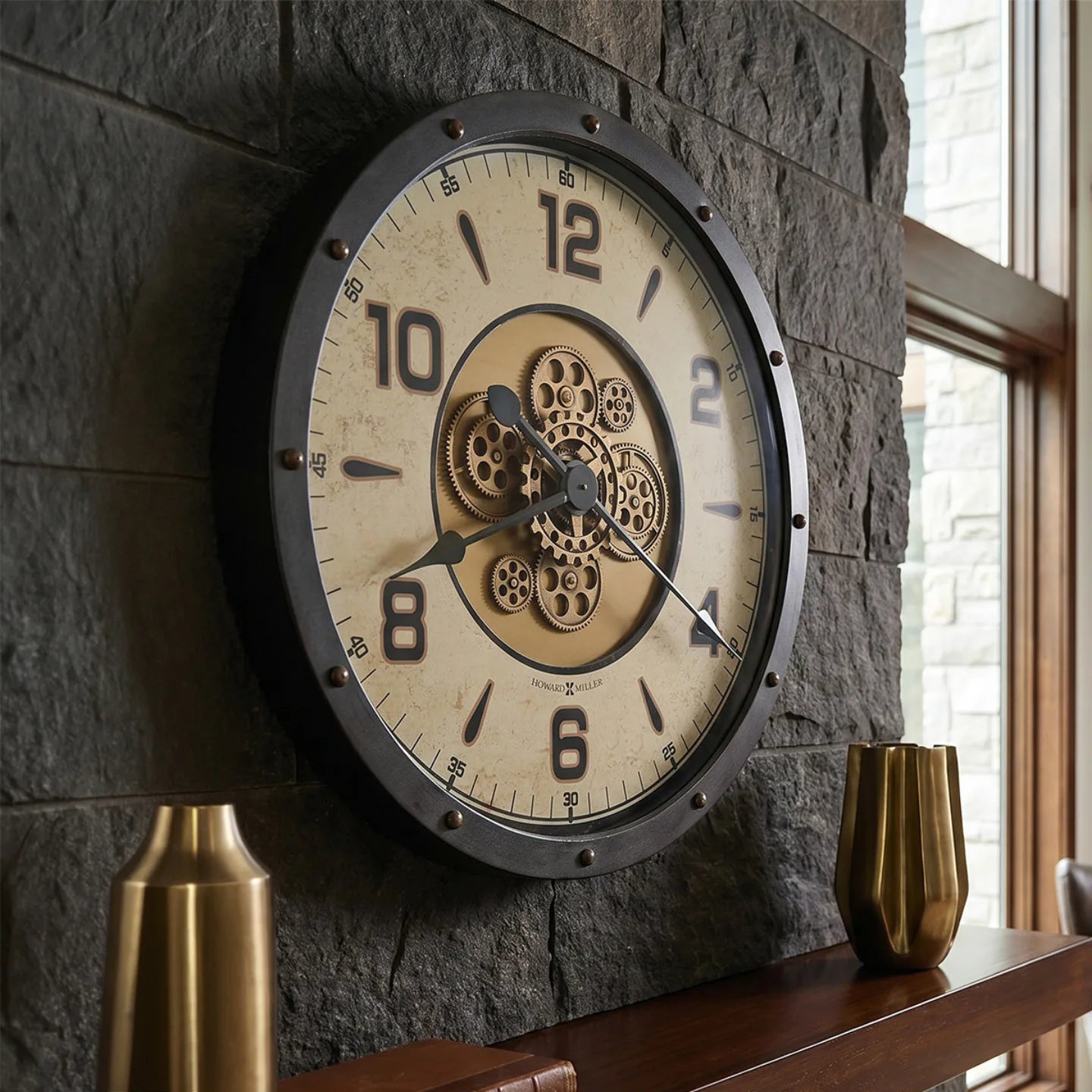 Howard Miller Garth Wall Clock, 28-inch, on the wall in a styled room