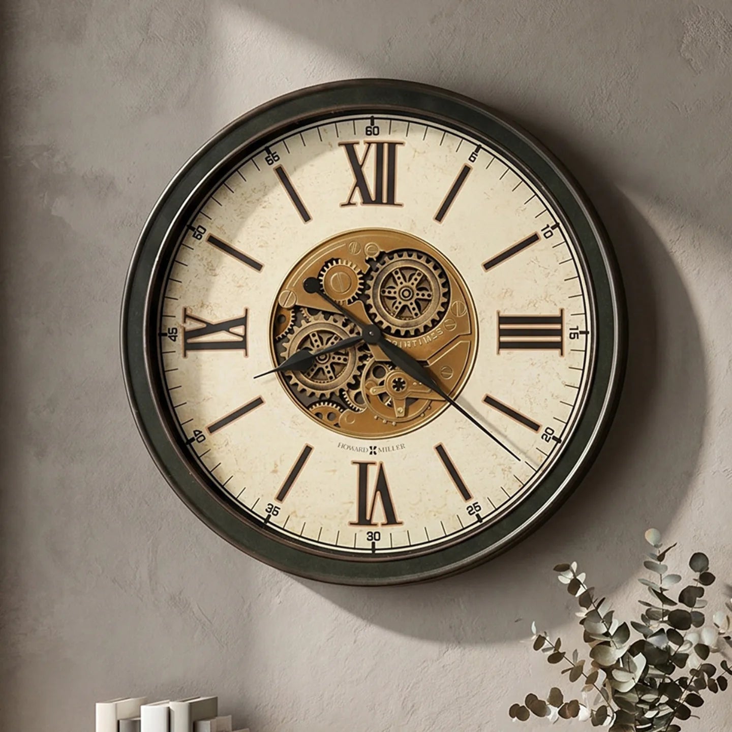 Howard Miller Hansel Wall Clock, 26-inch, on the wall in a styled room