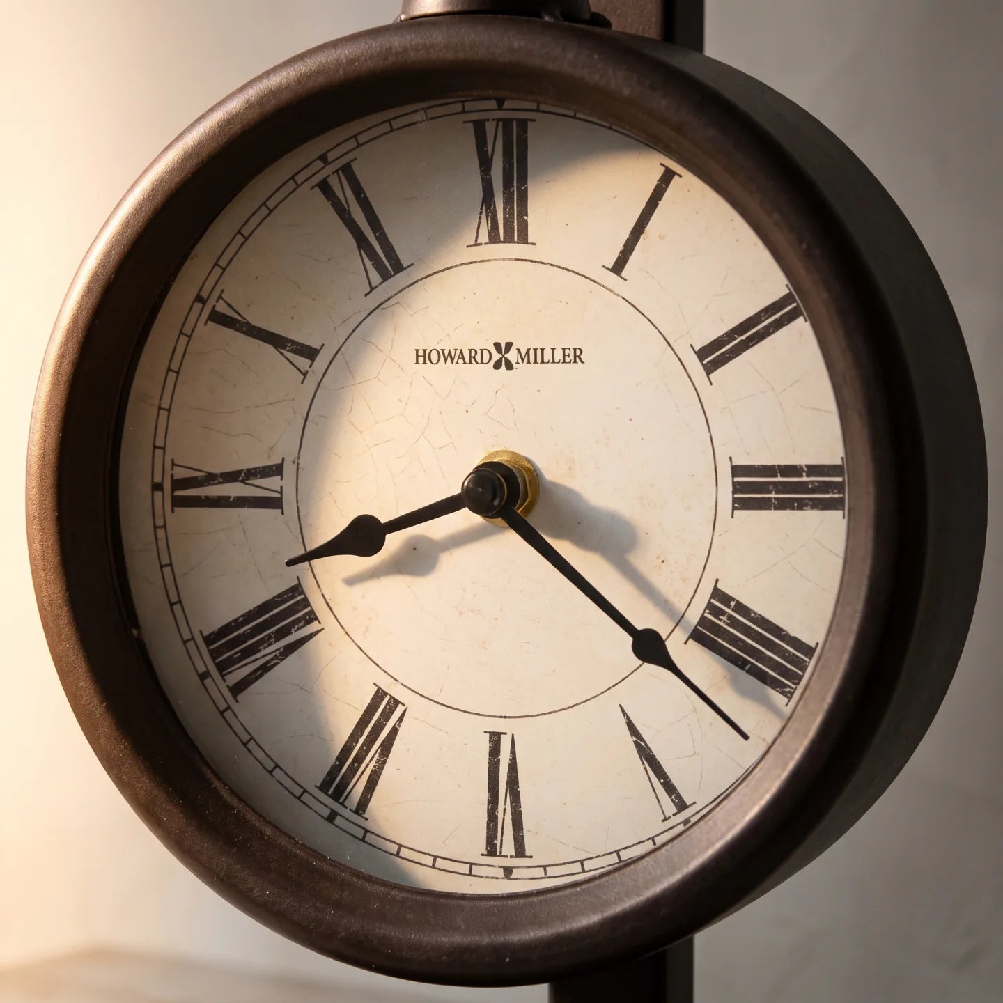Howard Miller Loman Mantel Clock, close-up of the dial and finish detail