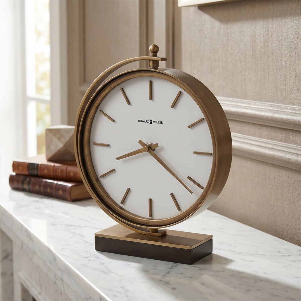 Howard Miller Mariam Accent Clock, 10-inch, on a shelf in a styled room
