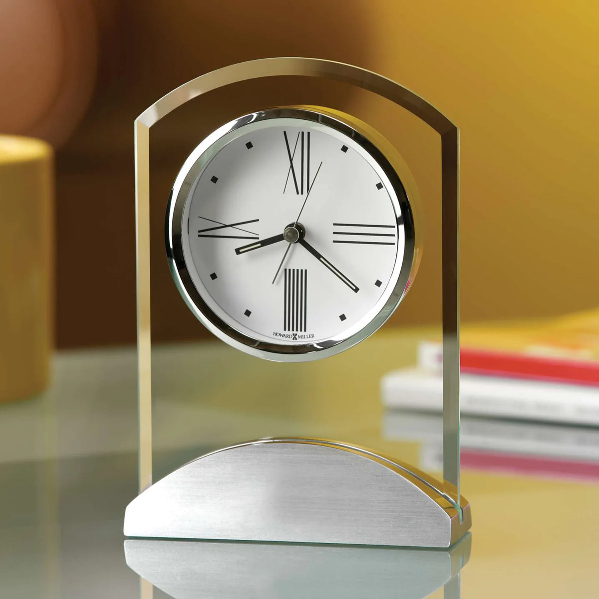Howard Miller Tribeca Tabletop Clock, 6-inch, on a shelf in a styled room