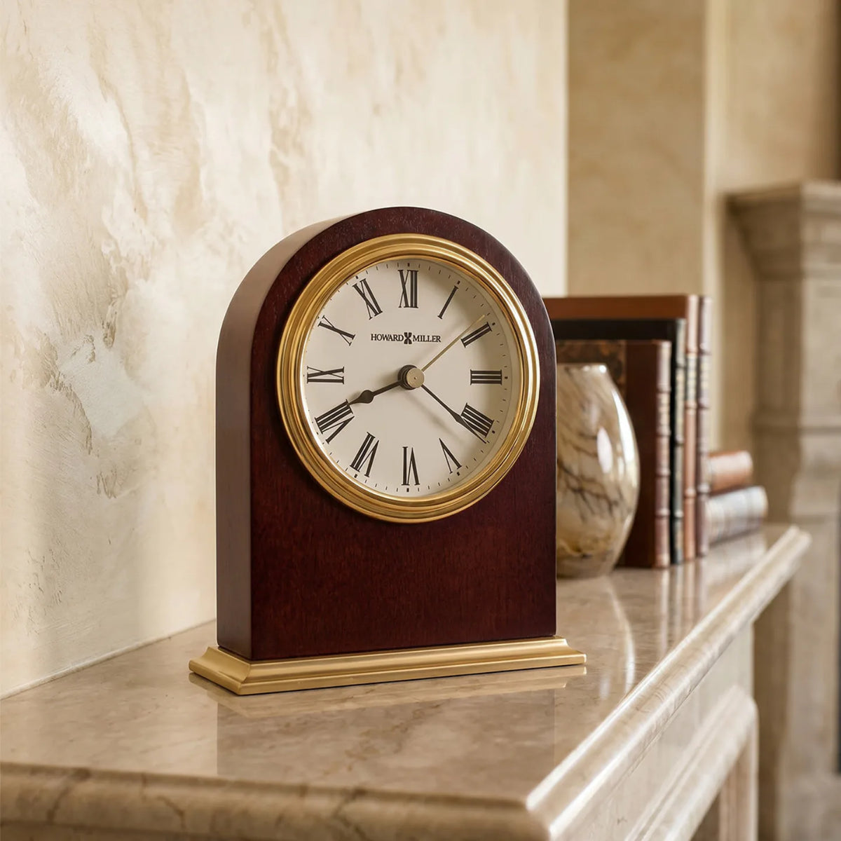 Howard Miller Craven Tabletop Clock, 5-inch, on a shelf in a styled room