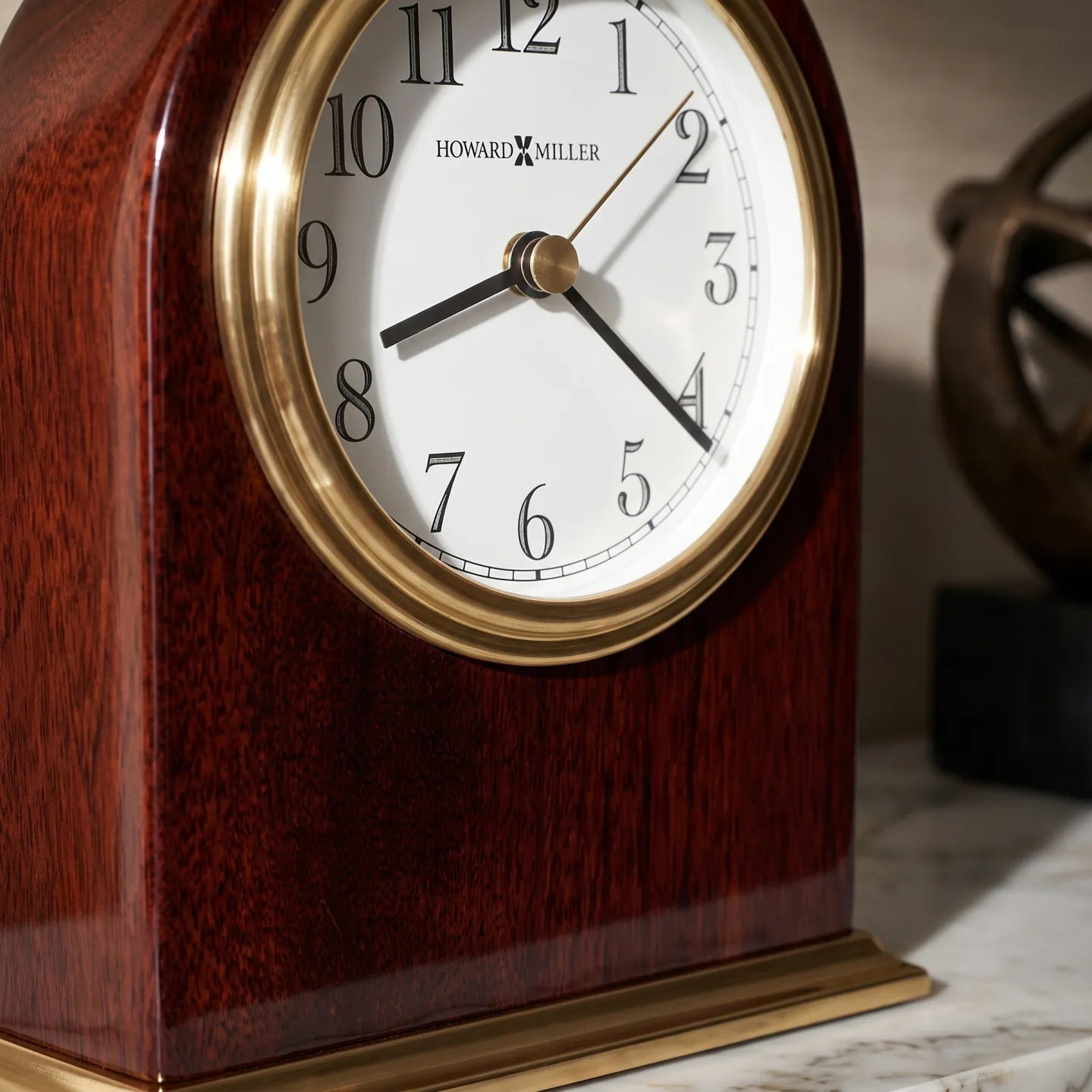 Howard Miller Monroe Tabletop Clock, close-up of the dial and finish detail