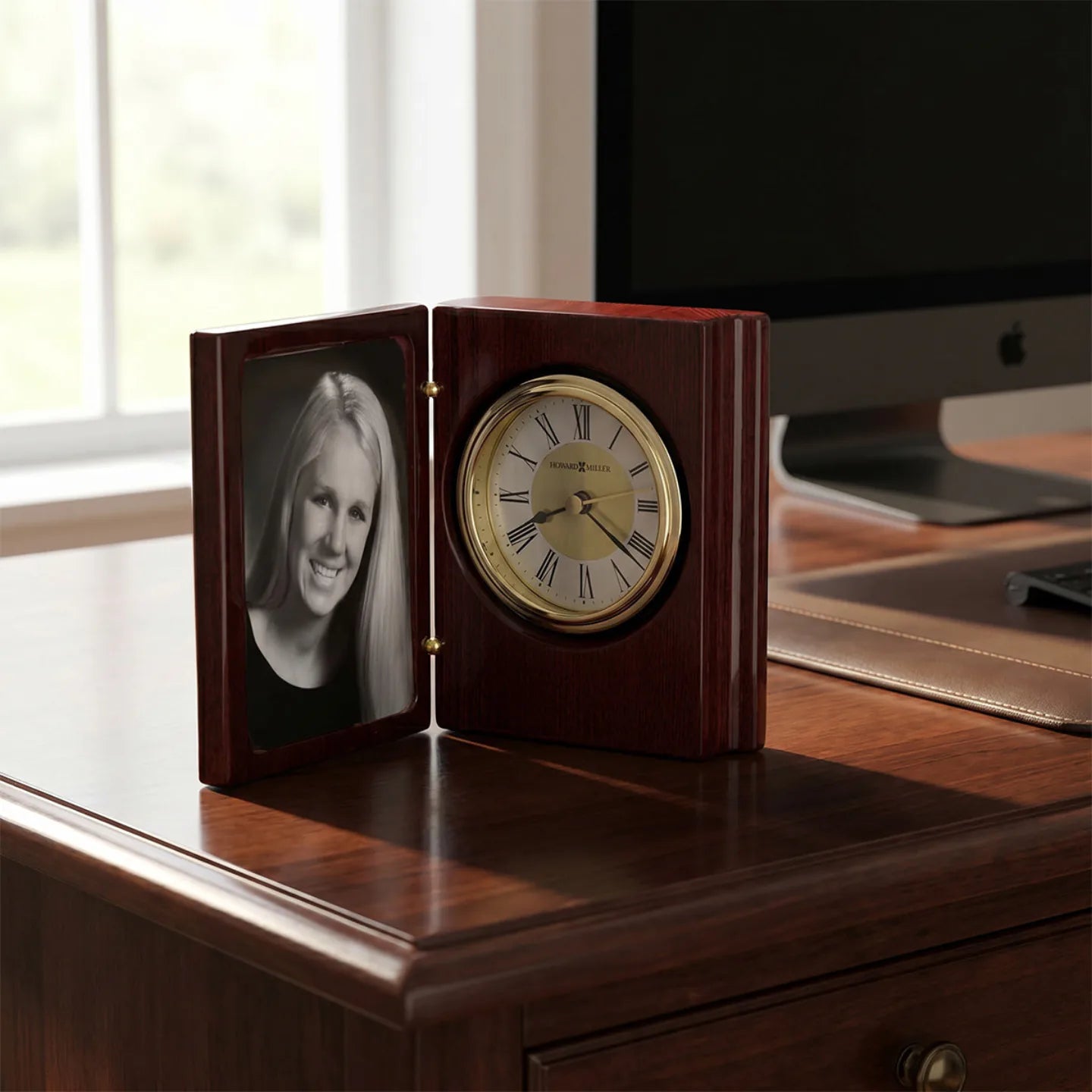 Howard Miller Portrait Book Tabletop Clock, 5-inch, on a shelf in a styled room