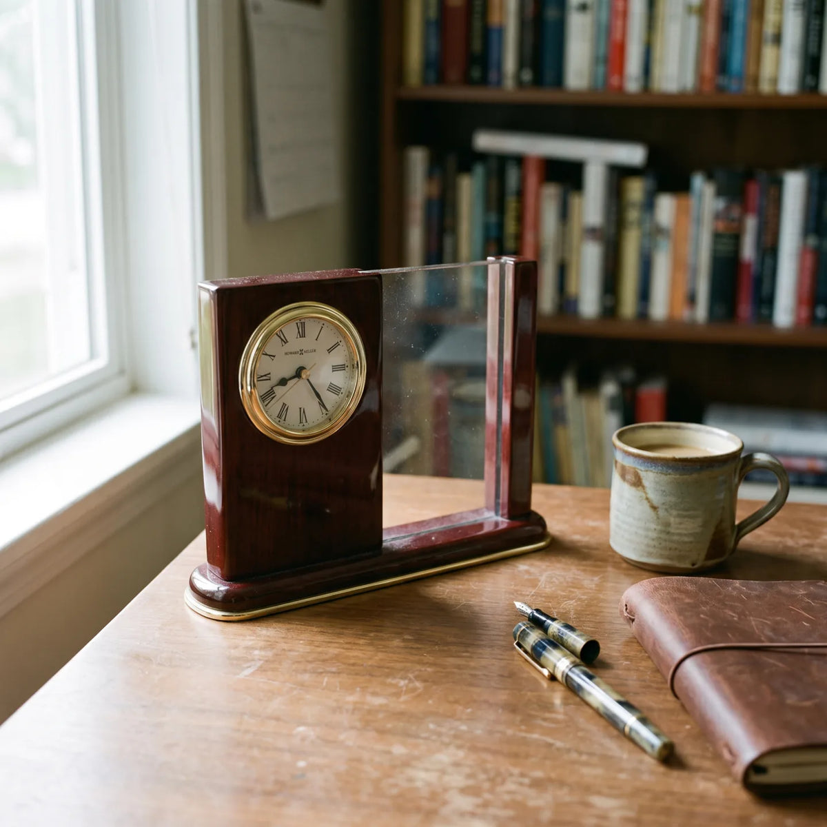 Howard Miller Portrait Caddy Tabletop Clock, 8-inch, on a shelf in a styled room