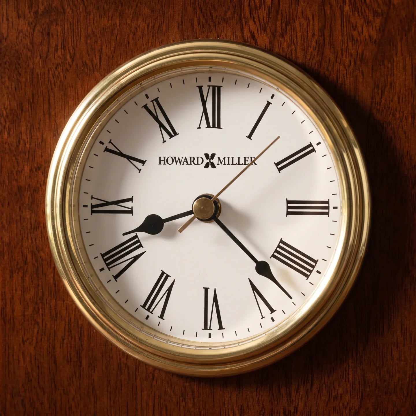 Howard Miller Windsor Carriage Tabletop Clock, close-up of the dial and finish detail