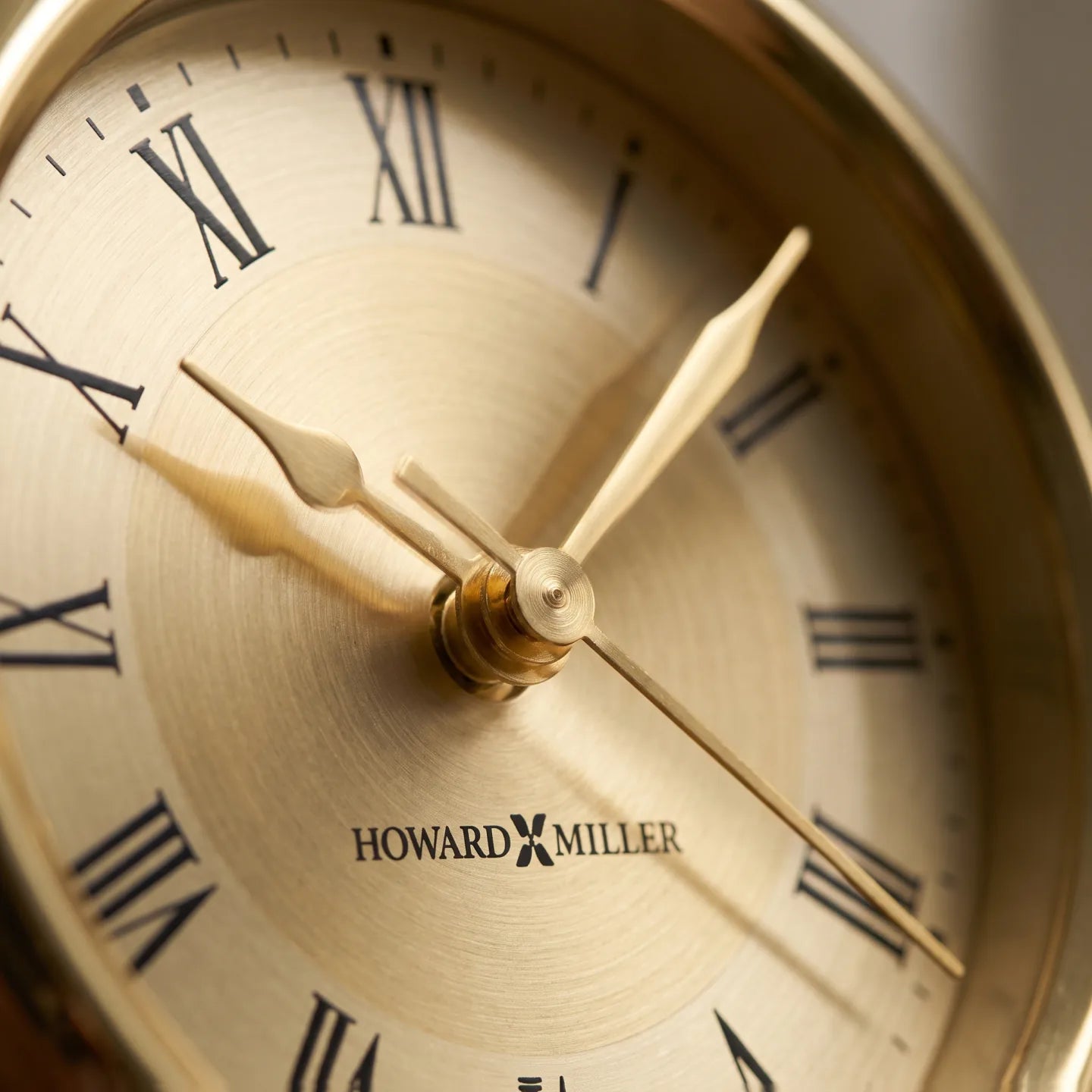 Howard Miller Kensington Tabletop Clock, close-up of the dial and finish detail